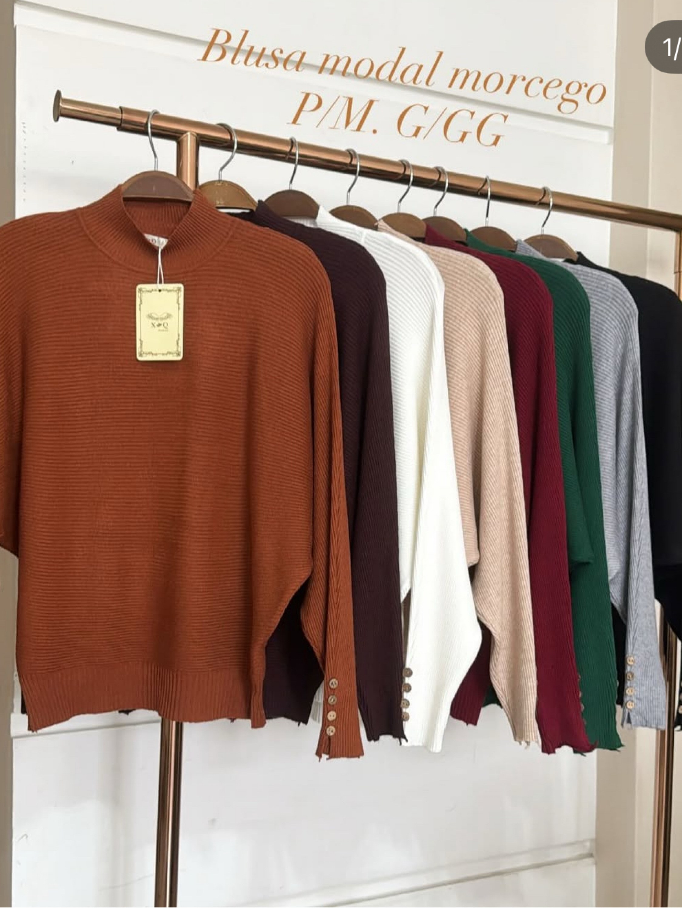 Blusa modal manga morcego com botão