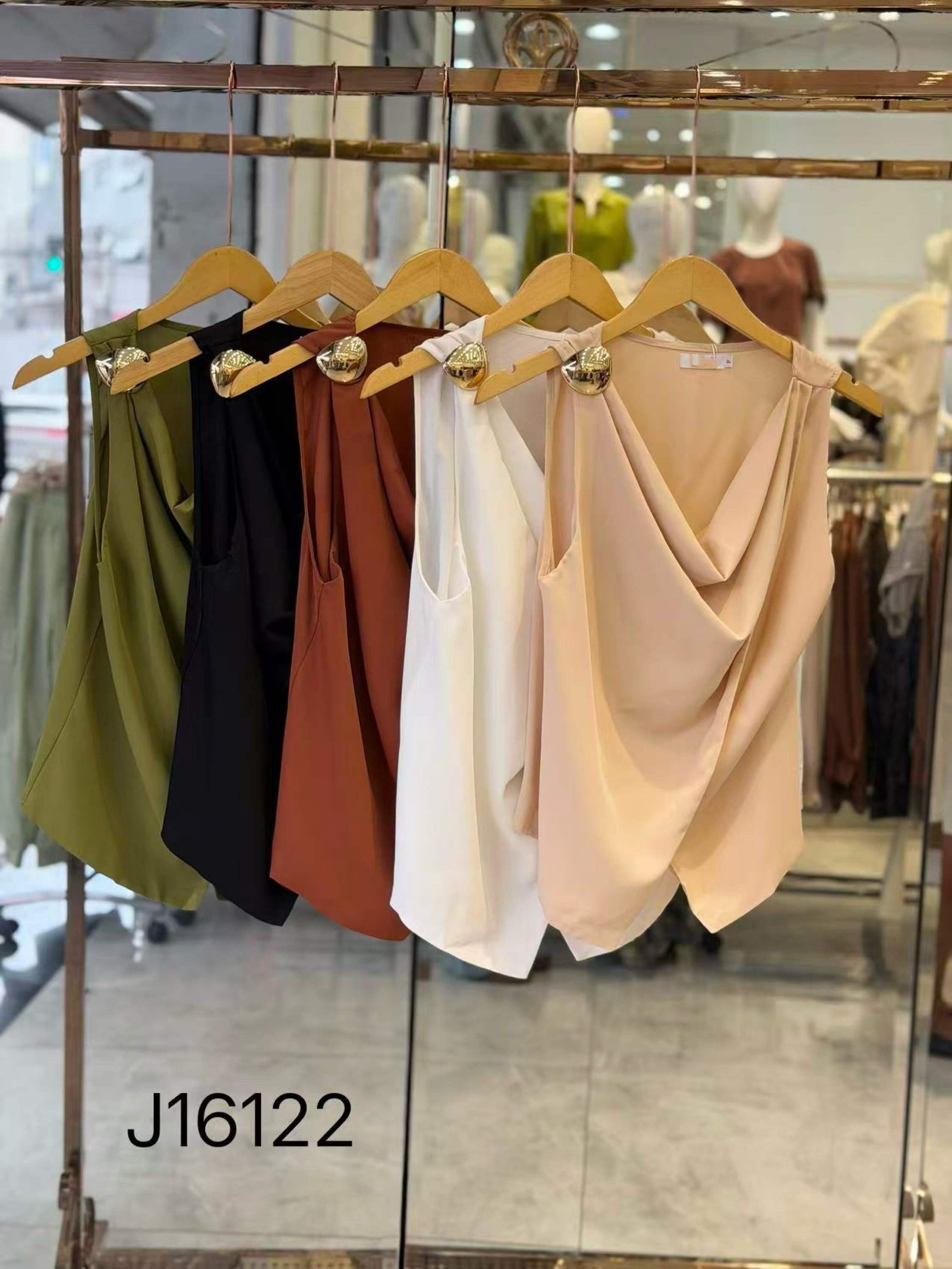 blusa com fivela sem manga shu loja