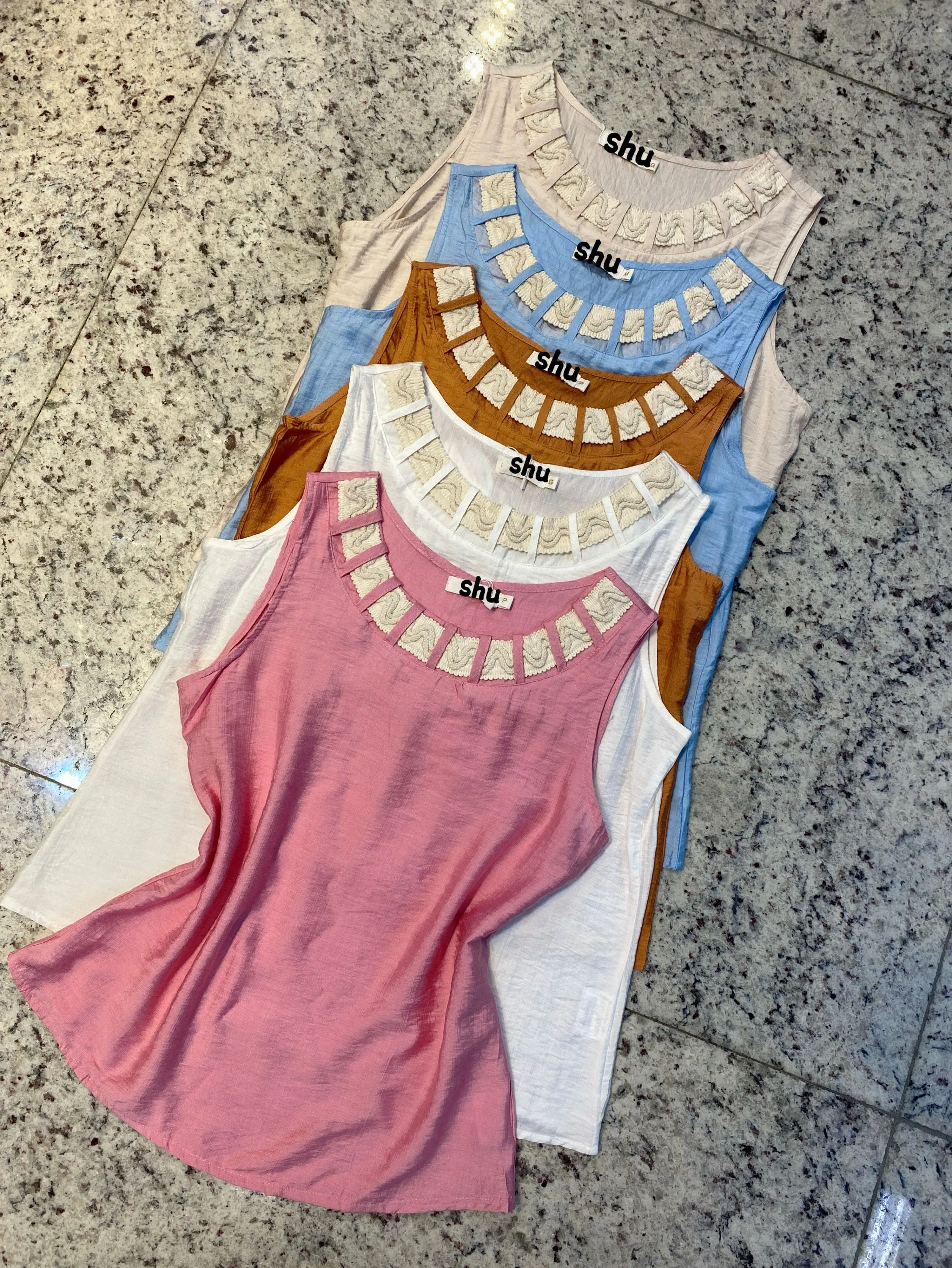 blusa lisa sem manga shu loja