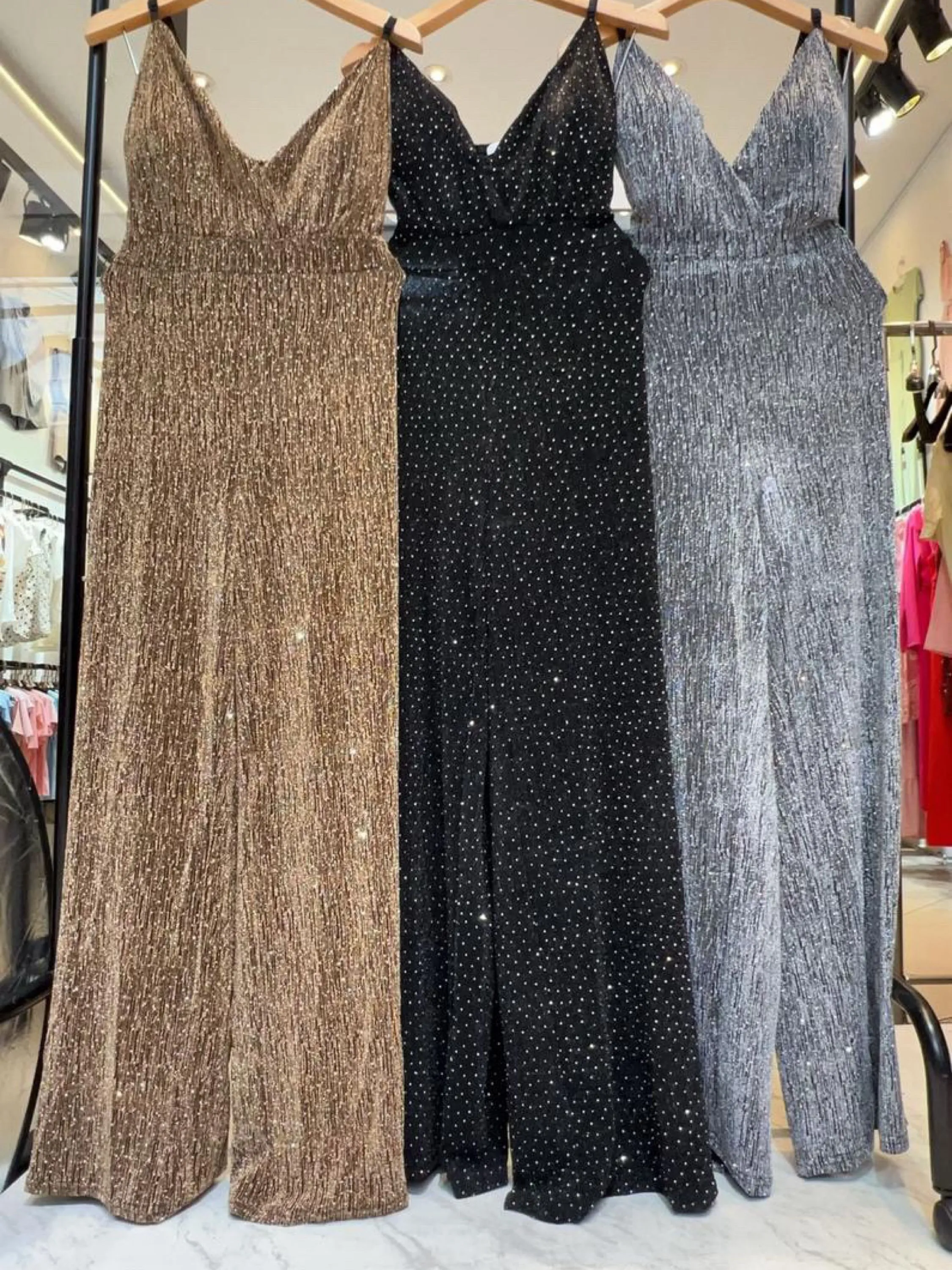 Macacão brilho estica social novidade linda