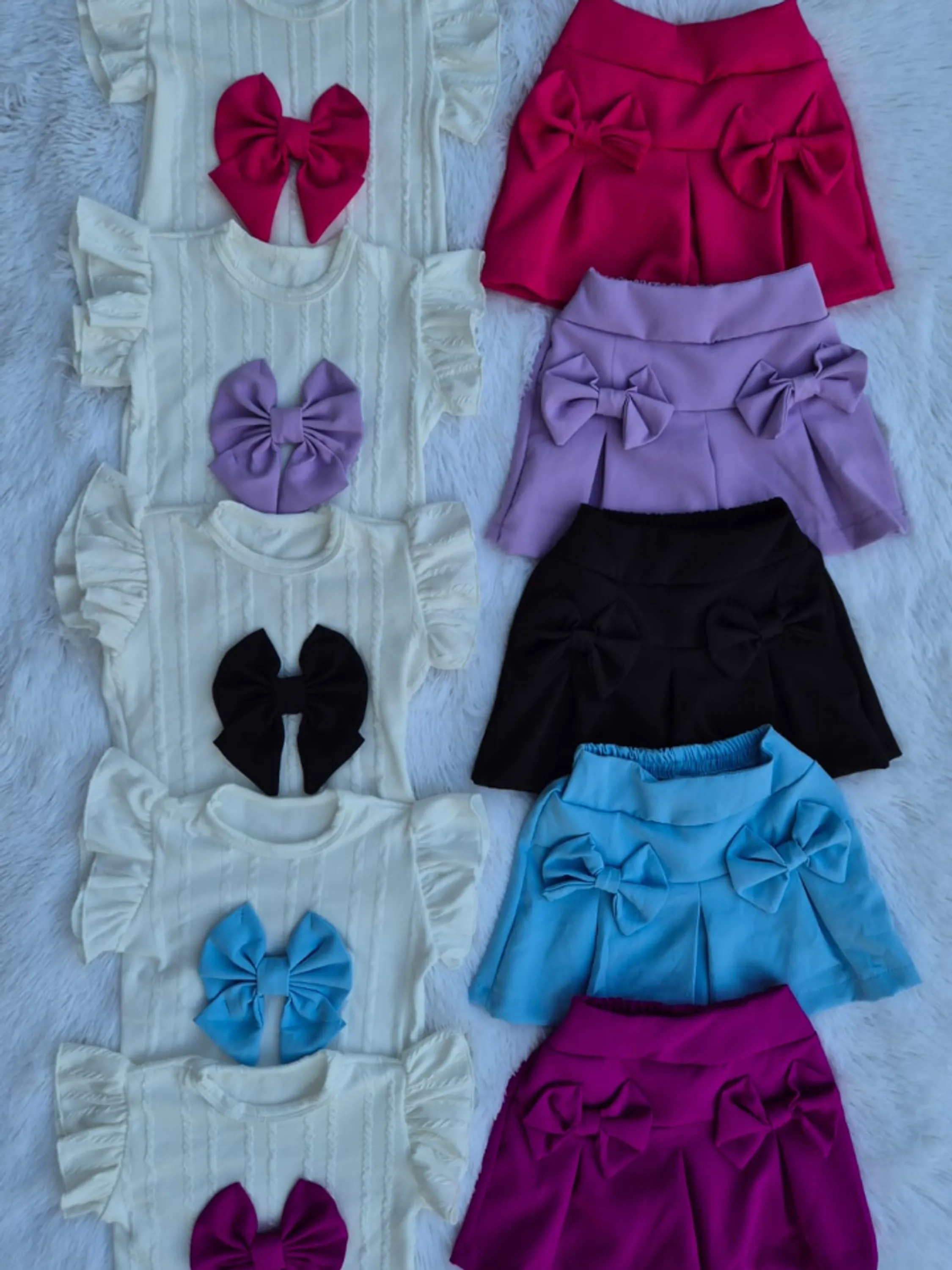 Conjunto infantil blusinha com laço shorts saia (Azul)