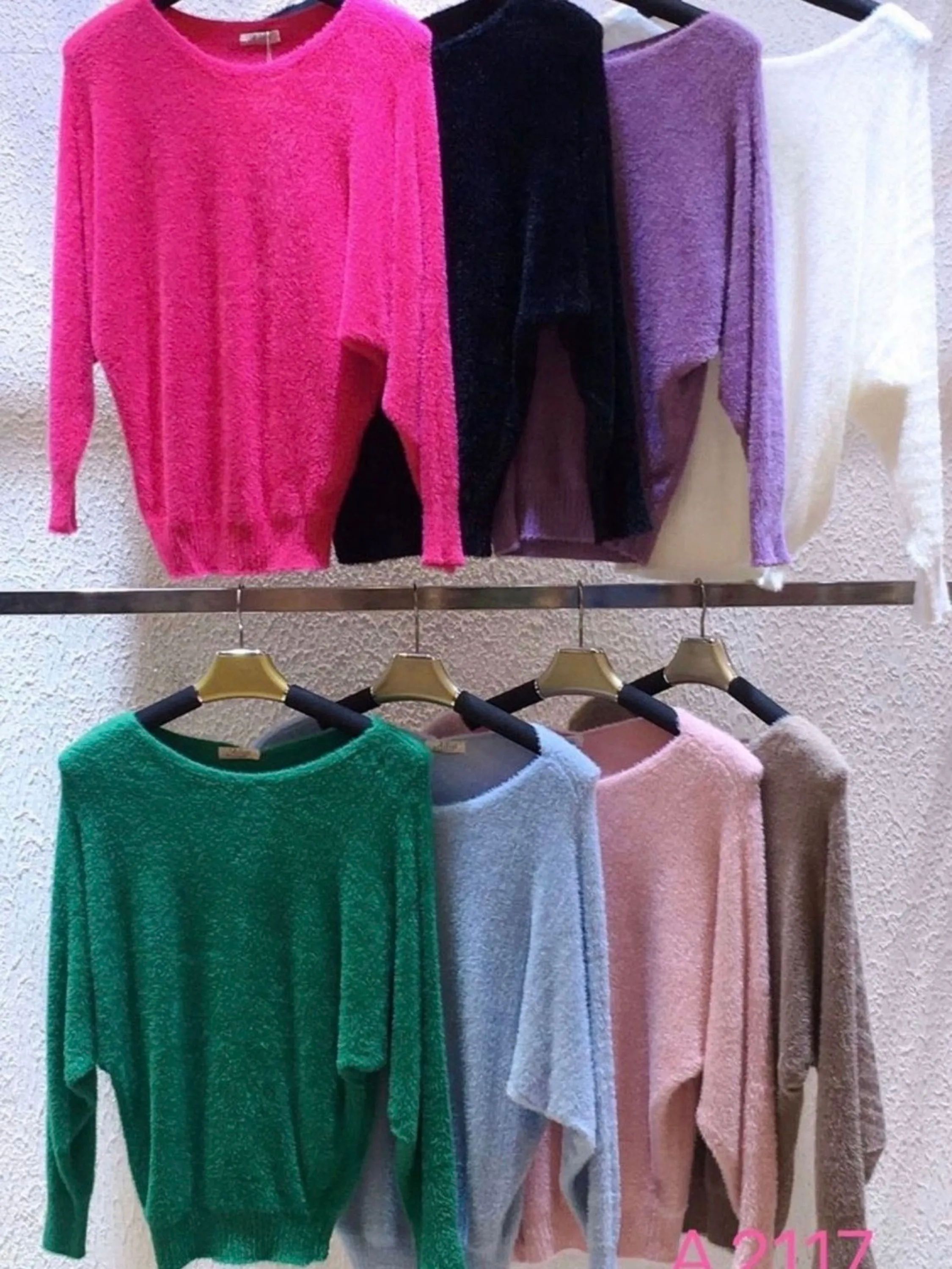 blusa de pelinho manga murcego importado