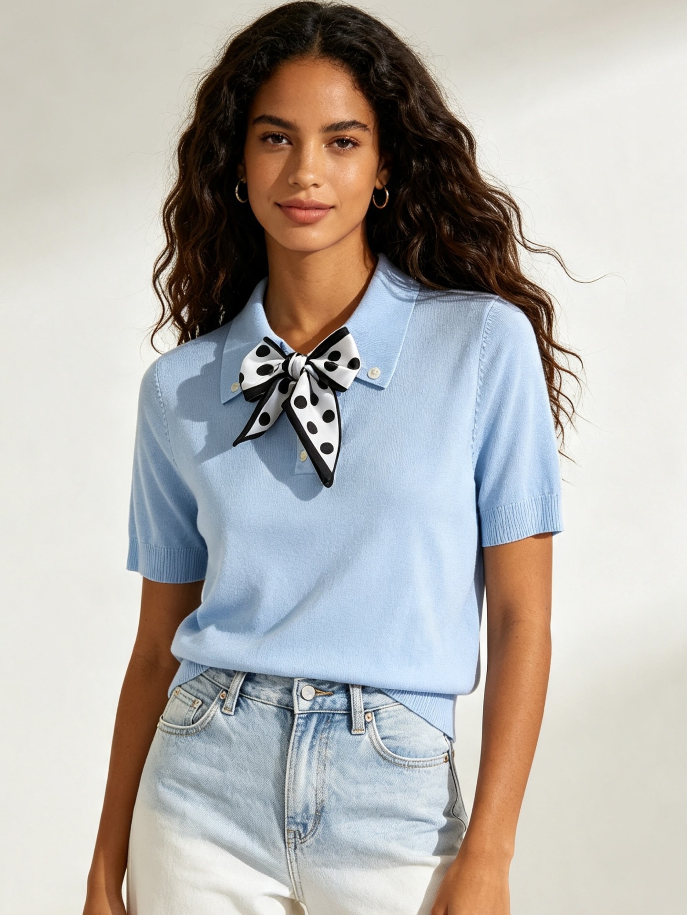 Blusa polo refrescante com laço poá