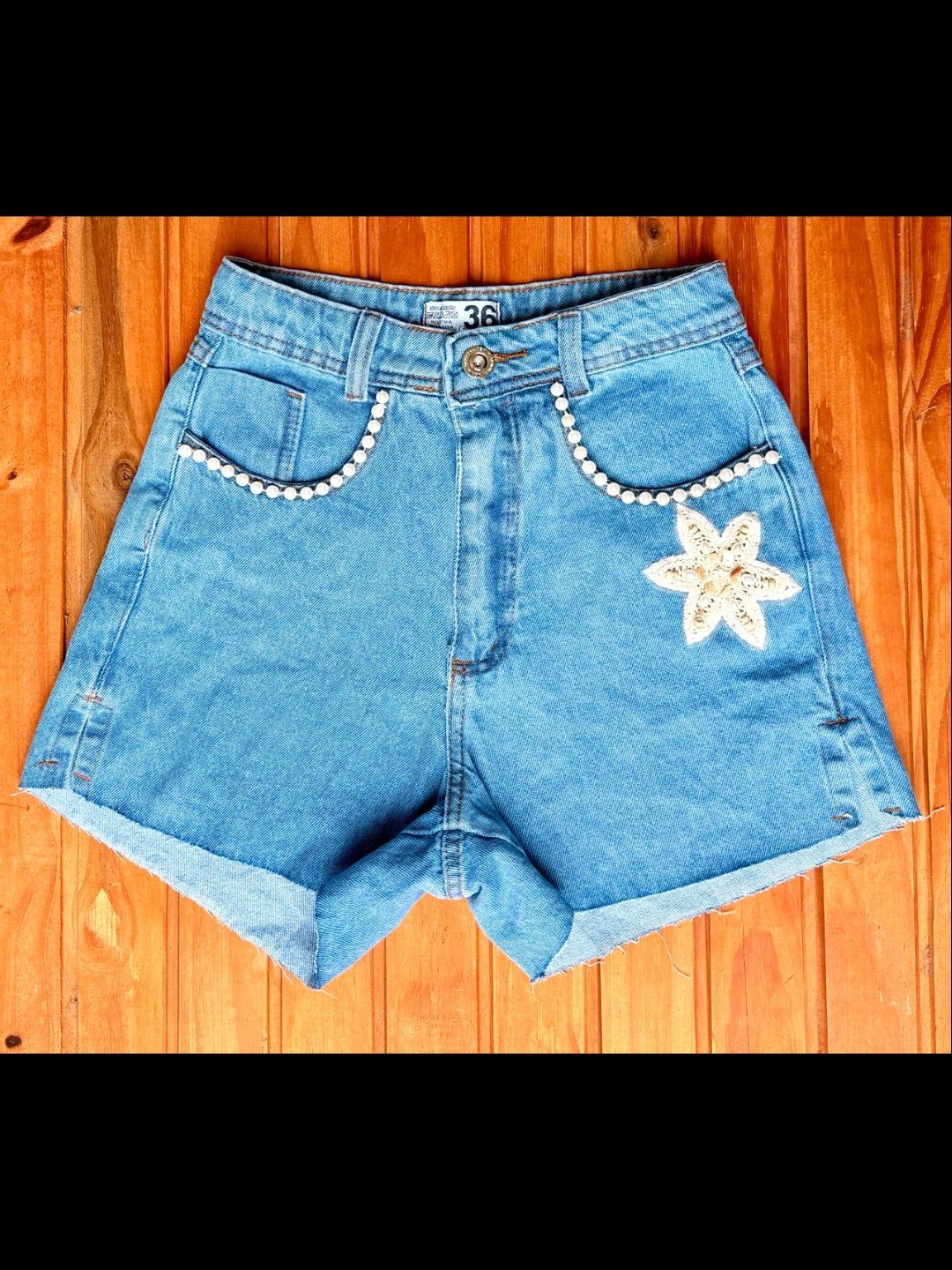 Short jeans com croche feminina