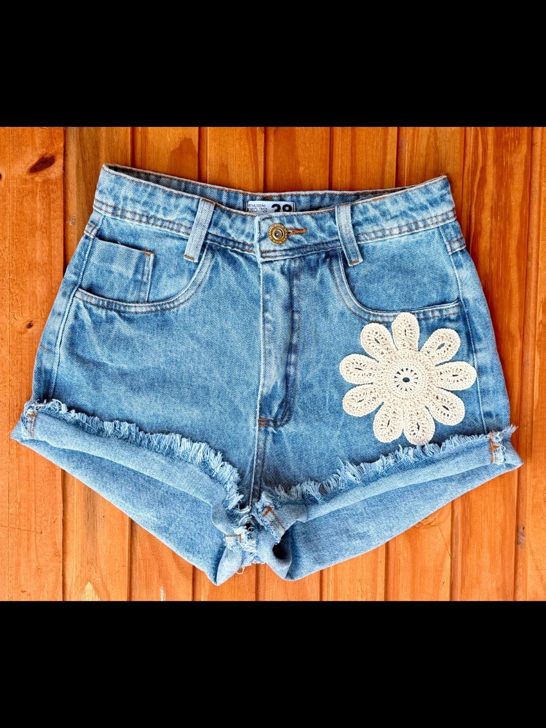 Short jeans croche feminina
