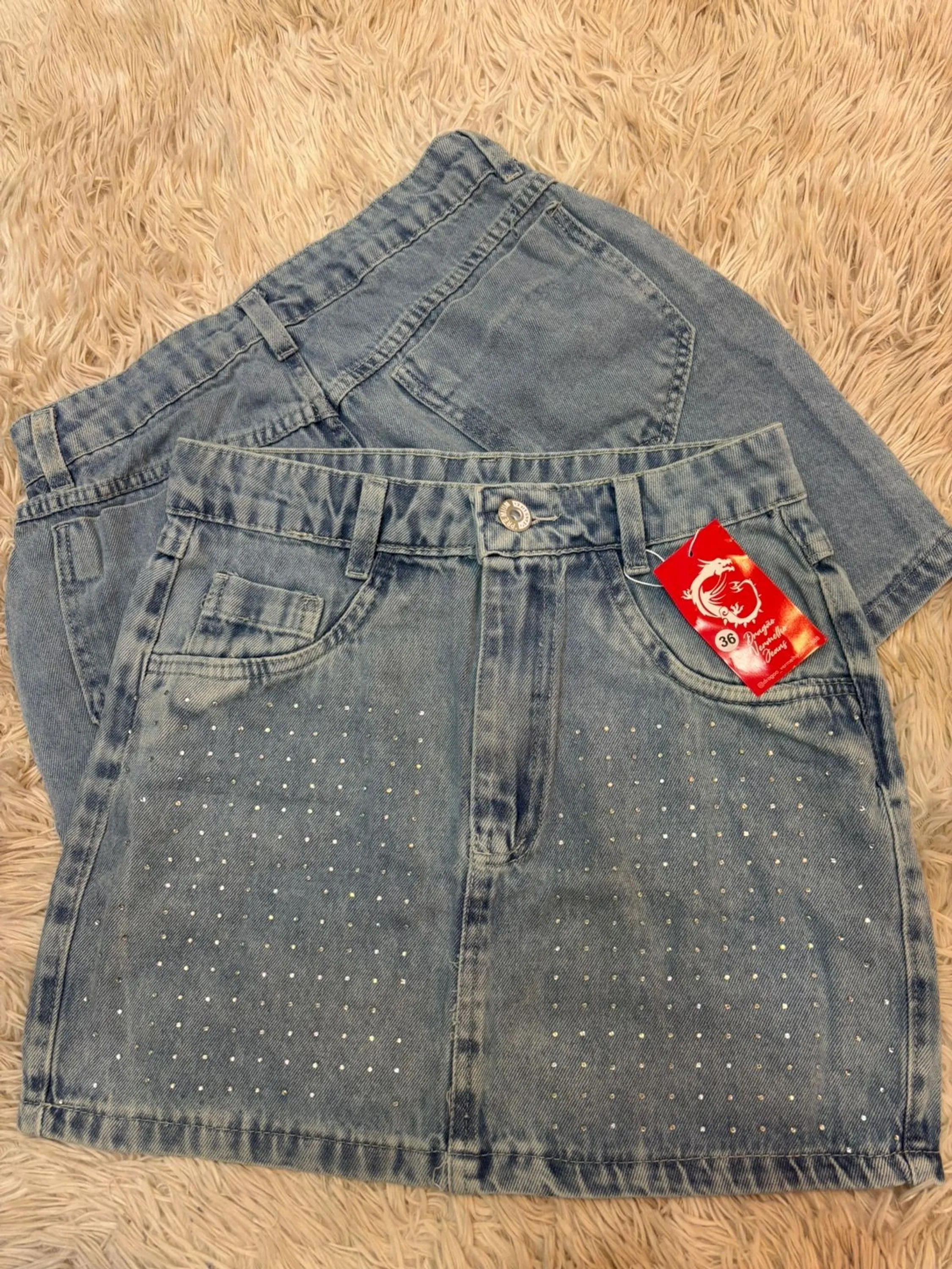 Saia jeans com pedra feminina