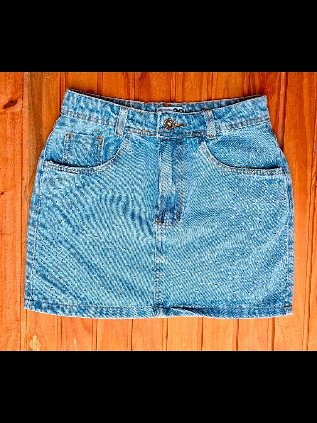 Saia jeans com pedra feminina