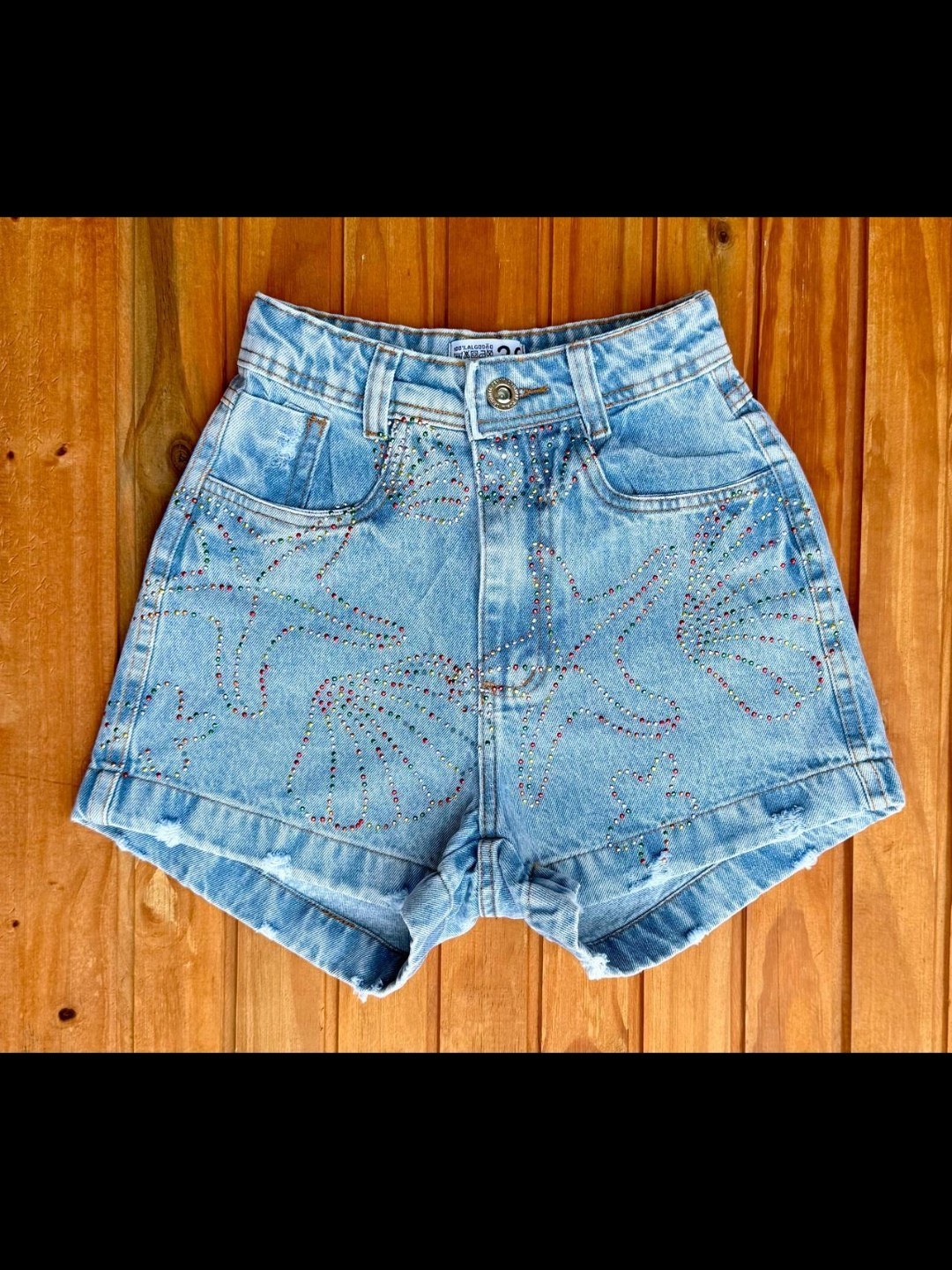 Short jeans com pedra feminina