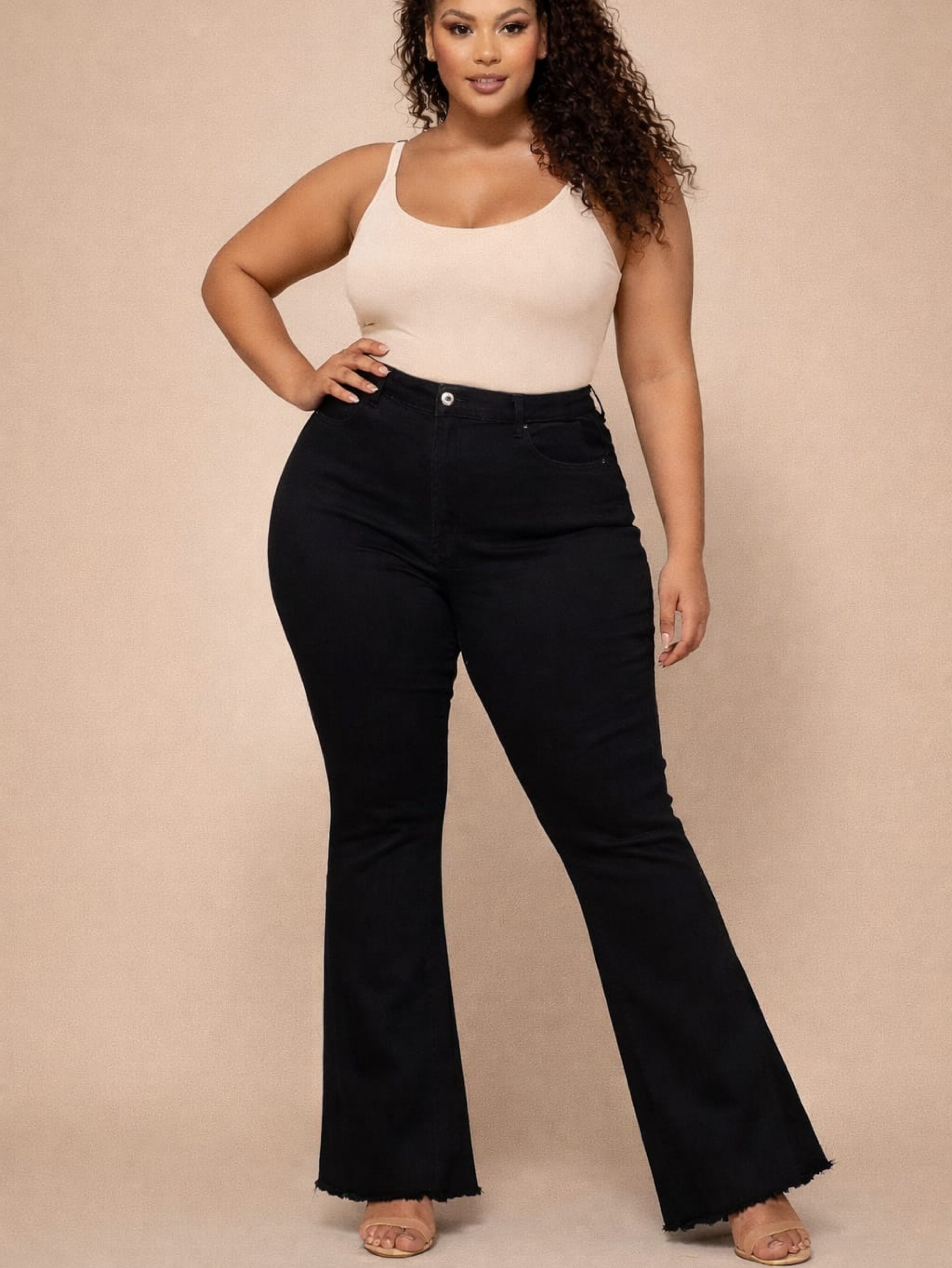 Calça jeans Flaer Preta com elastano , cintura alta