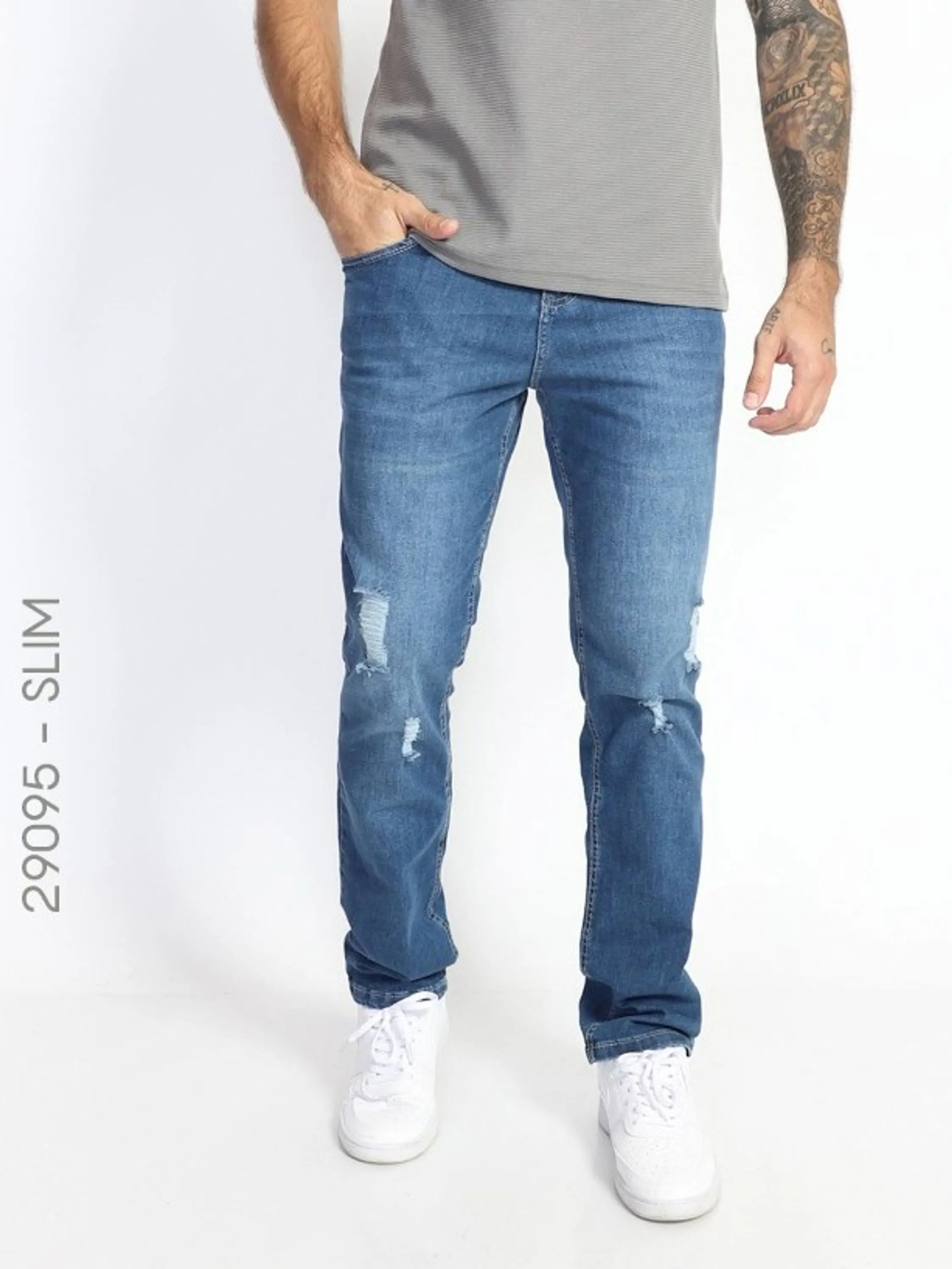 Calça Jeans Masculina Biotipo  Calça slim fit masculina, feita em algodão, poliéster e elastano de lavagem escura . Possui forro de bolso. *Zíper e botão frontal *Pala reta *Bolsos ... diversos modelos disponíveis