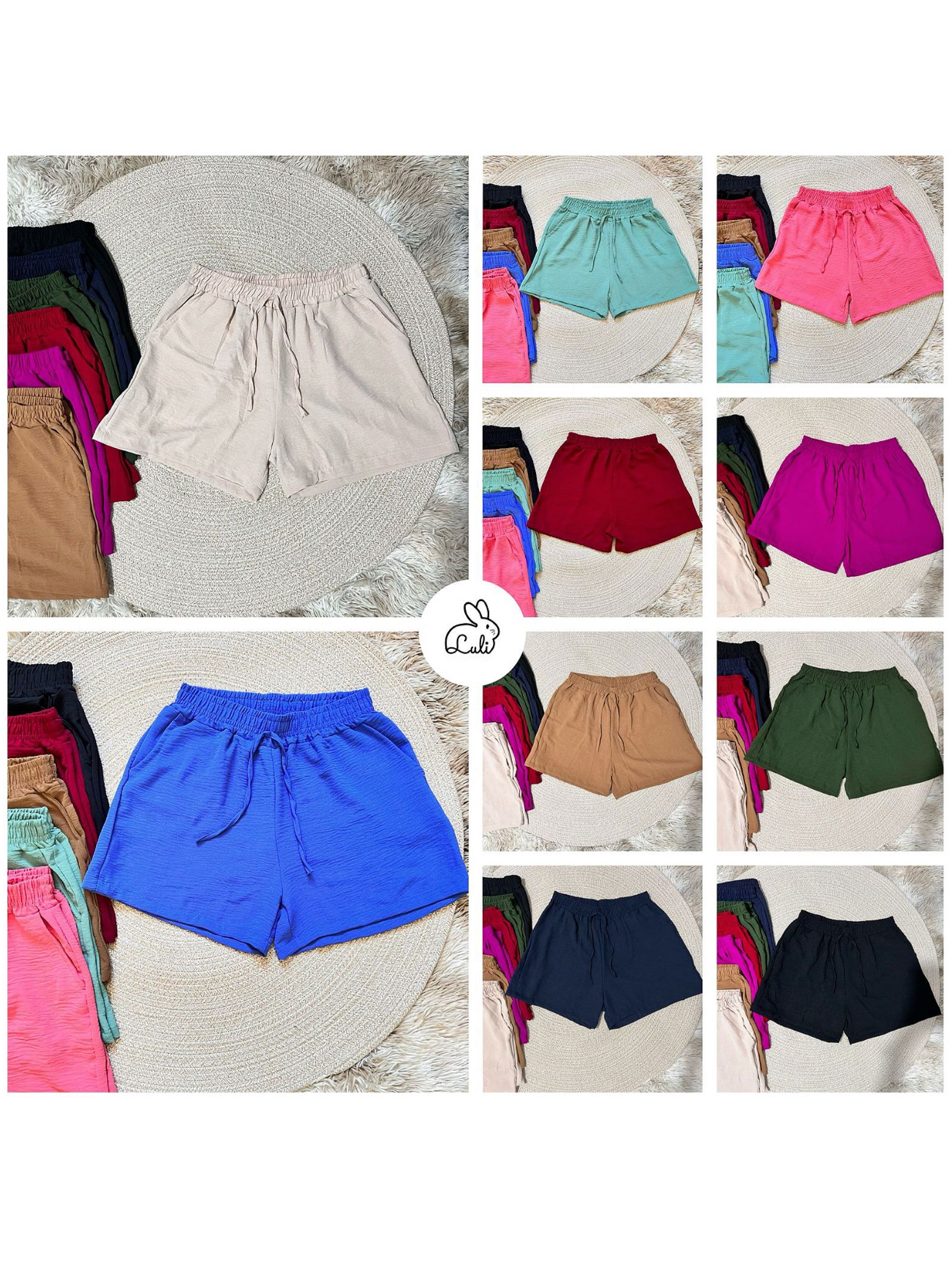 Short feminino liso tecido duna com bolsos laterais