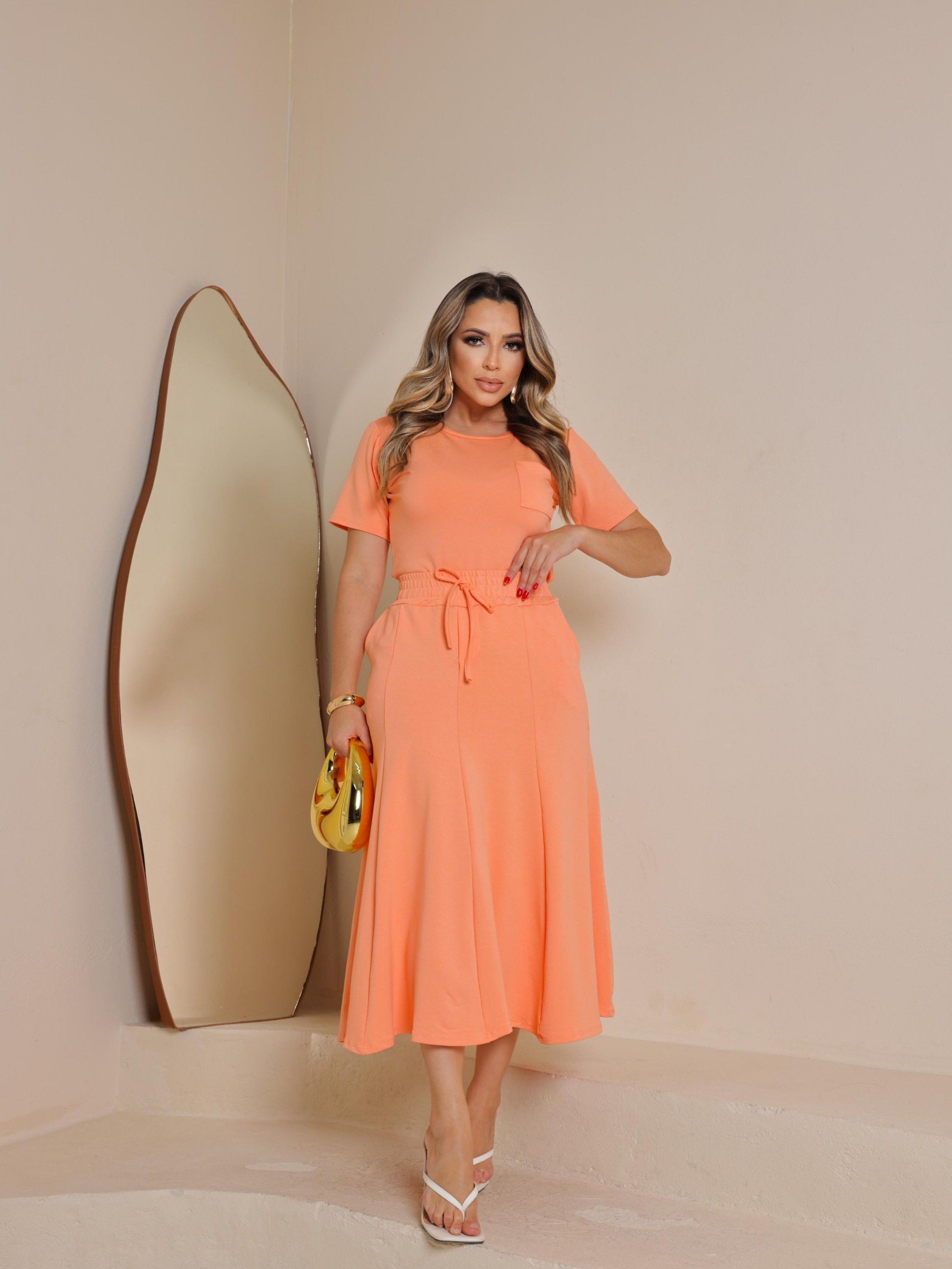 Conjunto de saia e blusa de moletinho