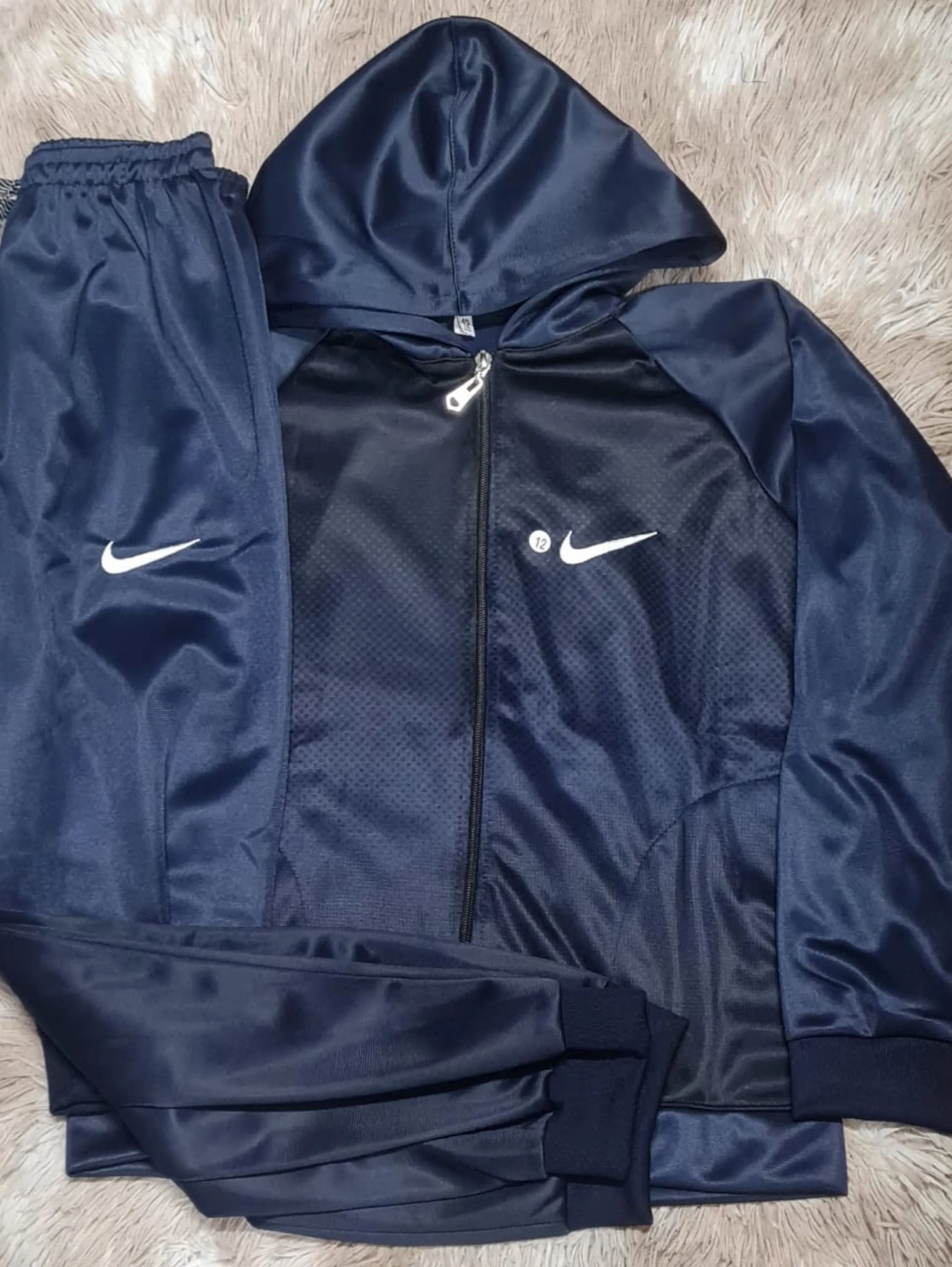Conjunto juvenil Nike tecido chimpa flanelado