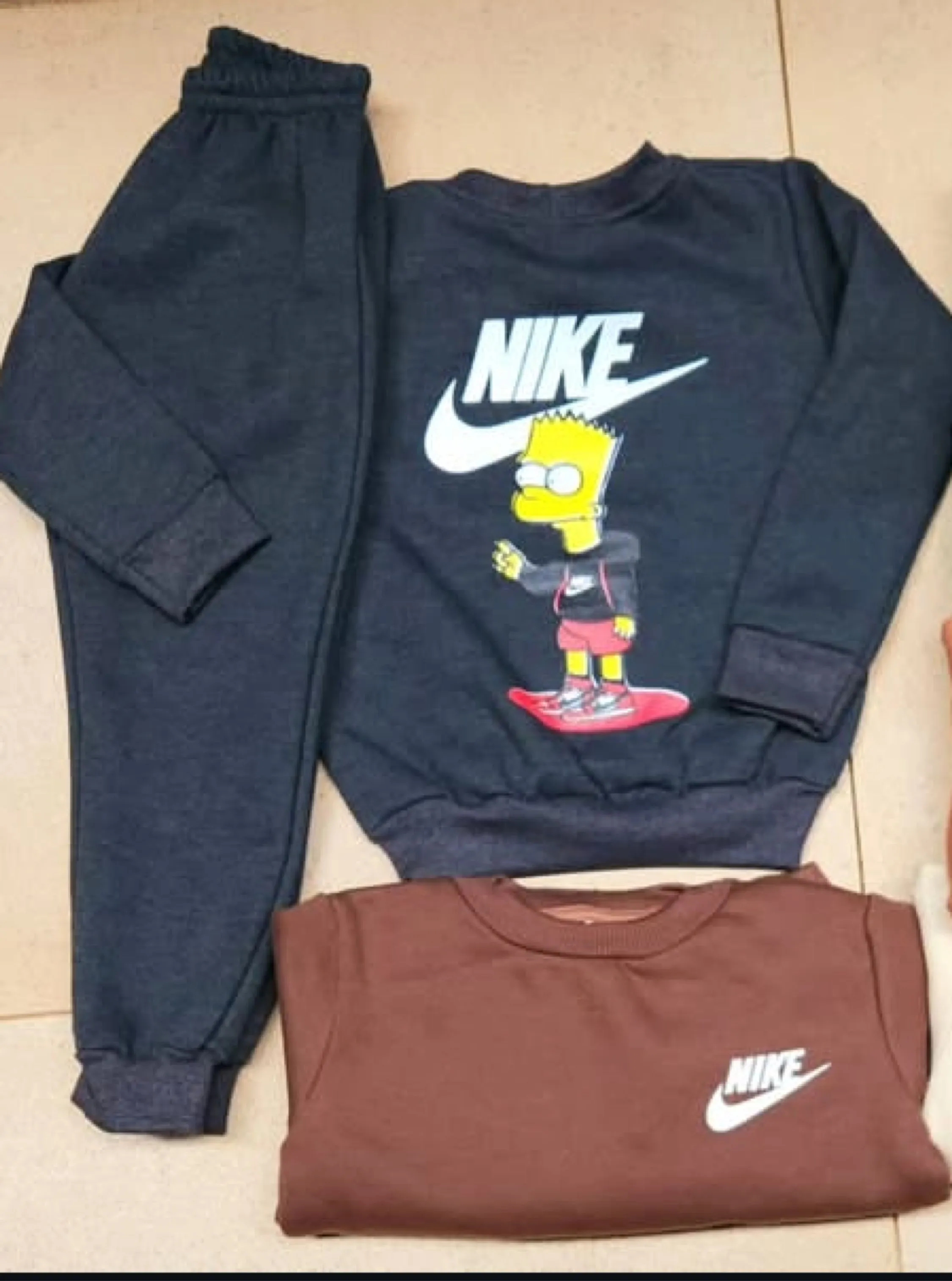 Conjunto de moletom forrado Nike indantil