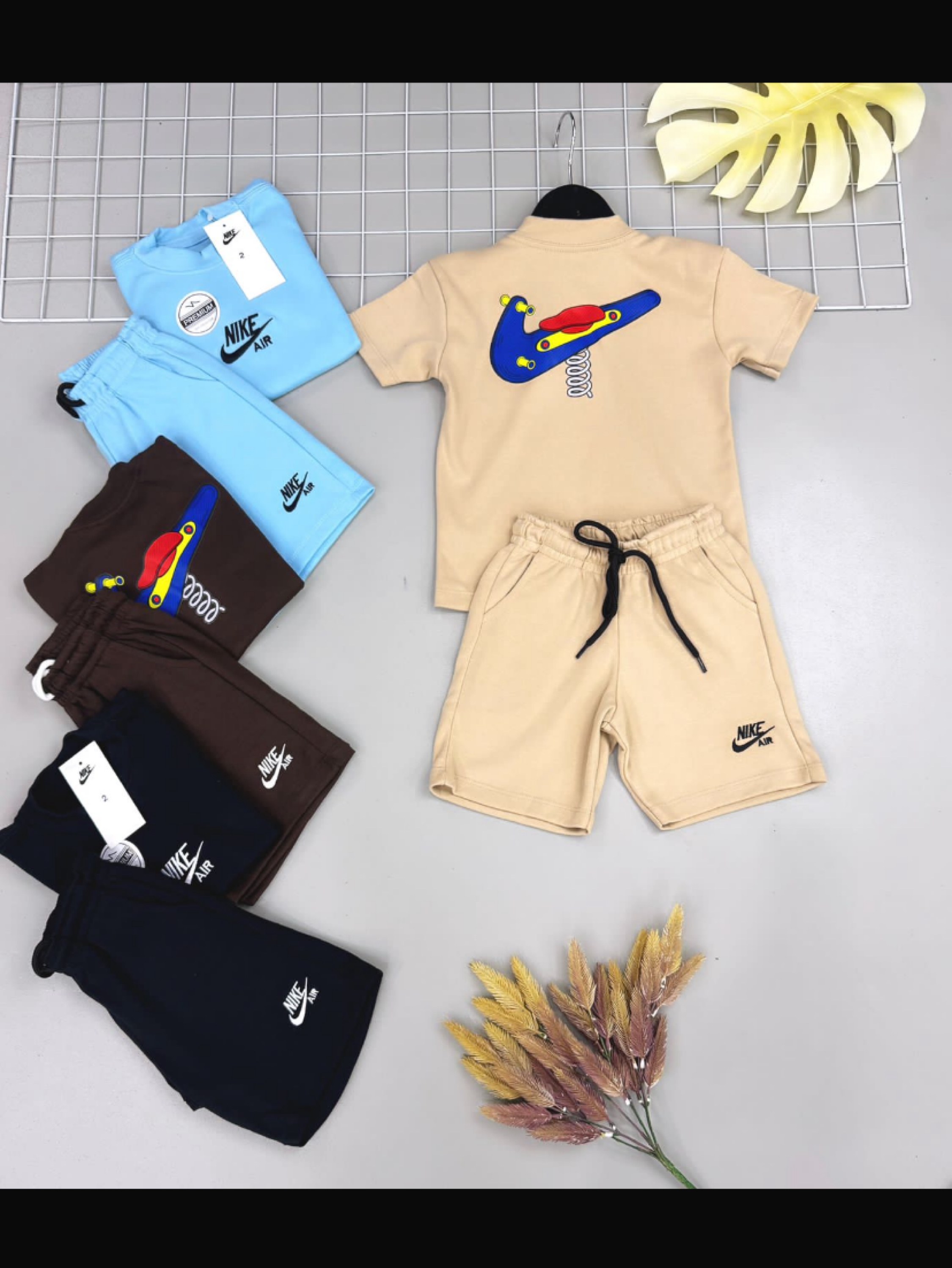 Conjunto bermuda e camiseta Nike infantil /juvenil