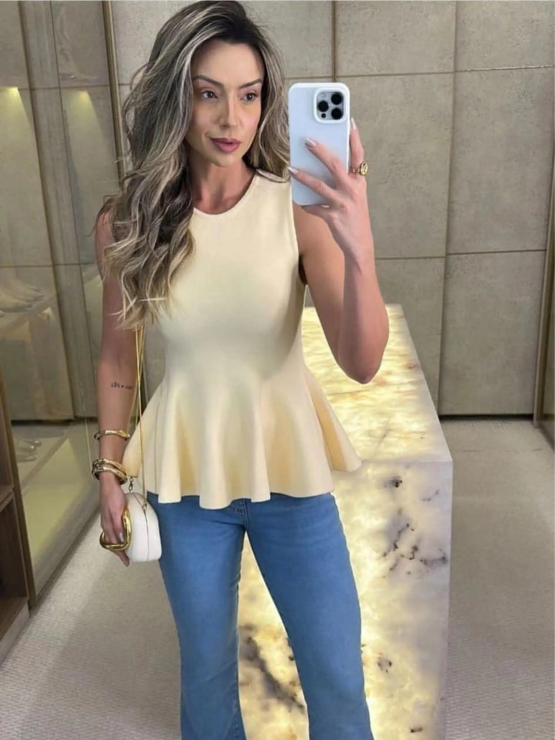 Blusa peplum sem manga tricô modal