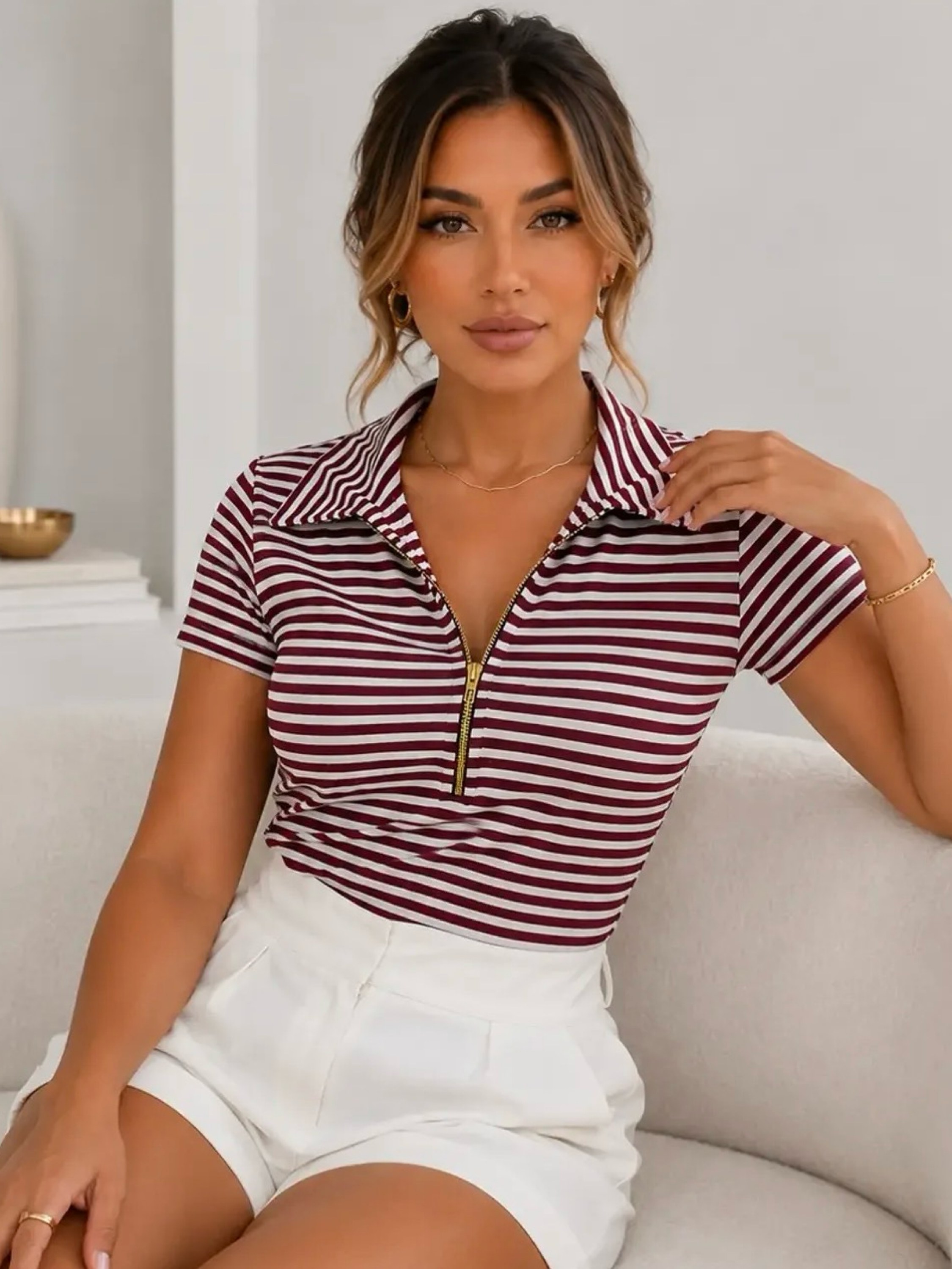 Blusa polo listrada zíper