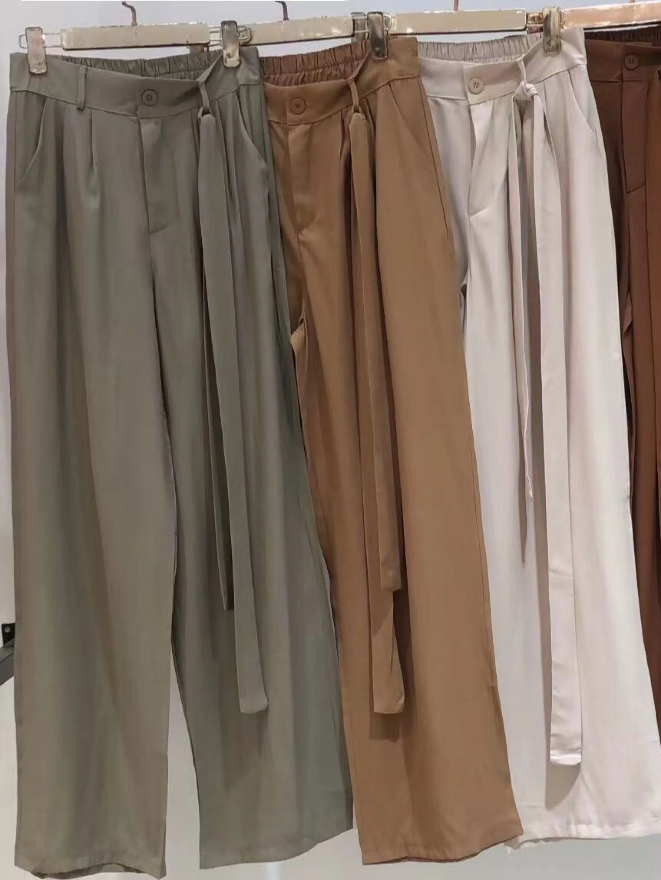 Calça de pantalona com cinto marrant importado pedro ji
