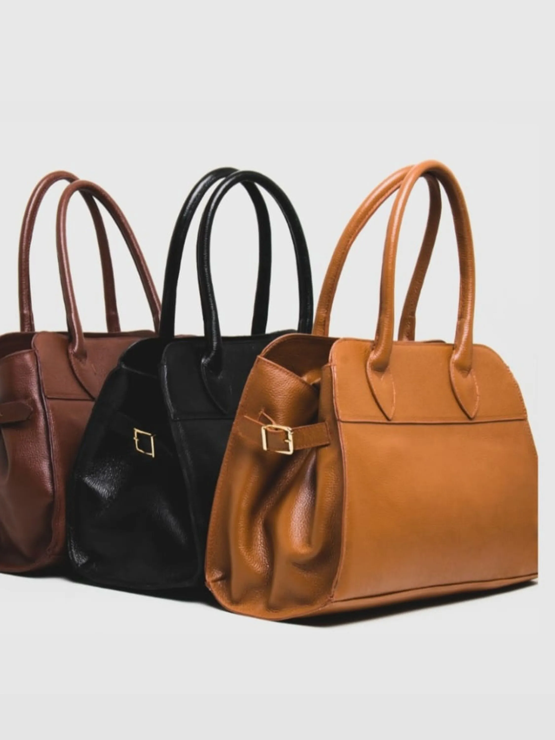 Bolsa bau lisa em couro 10450298