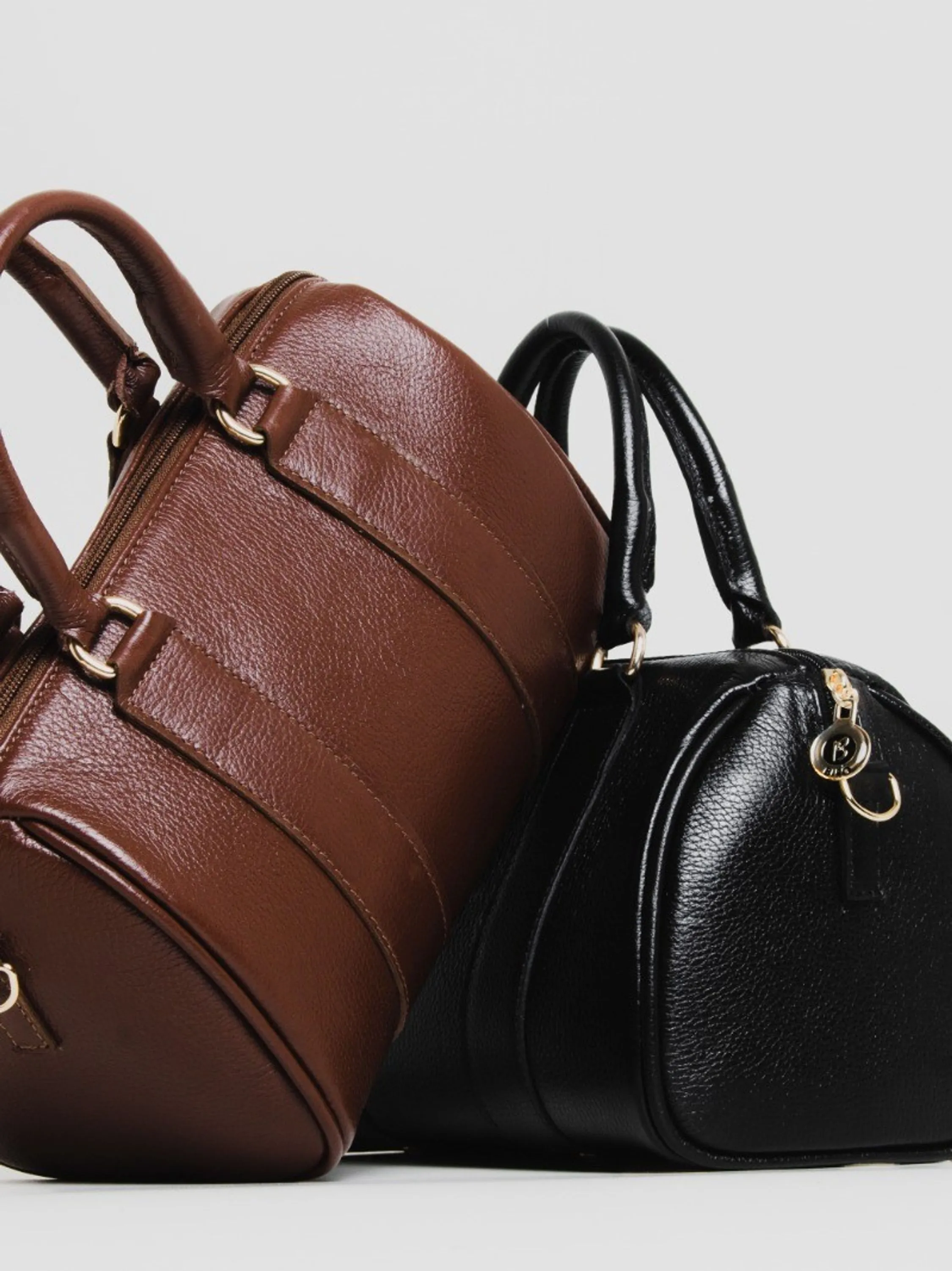 Bolsa bau em couro 10650195
