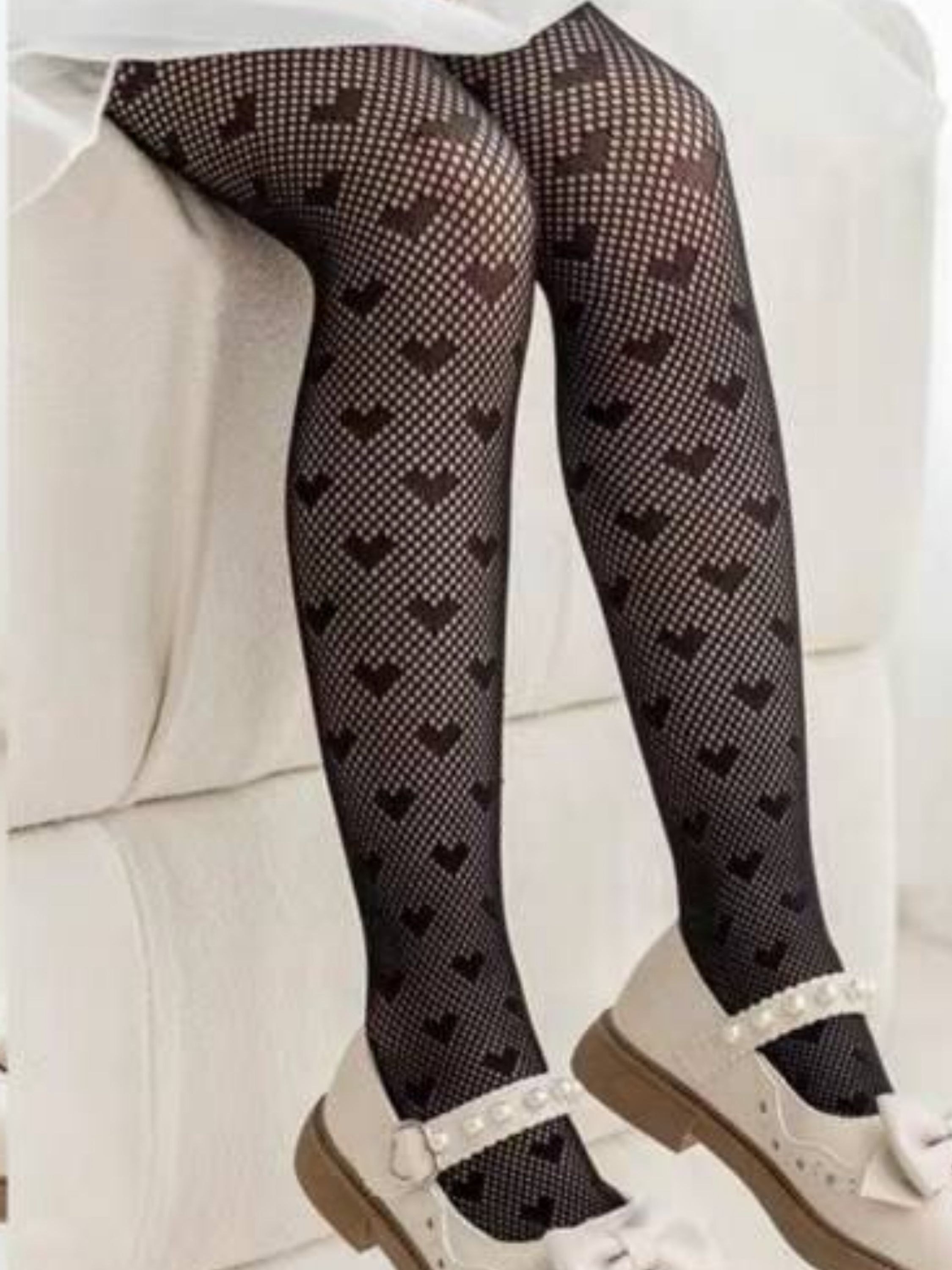 Meia calça arrastão infantil com coração