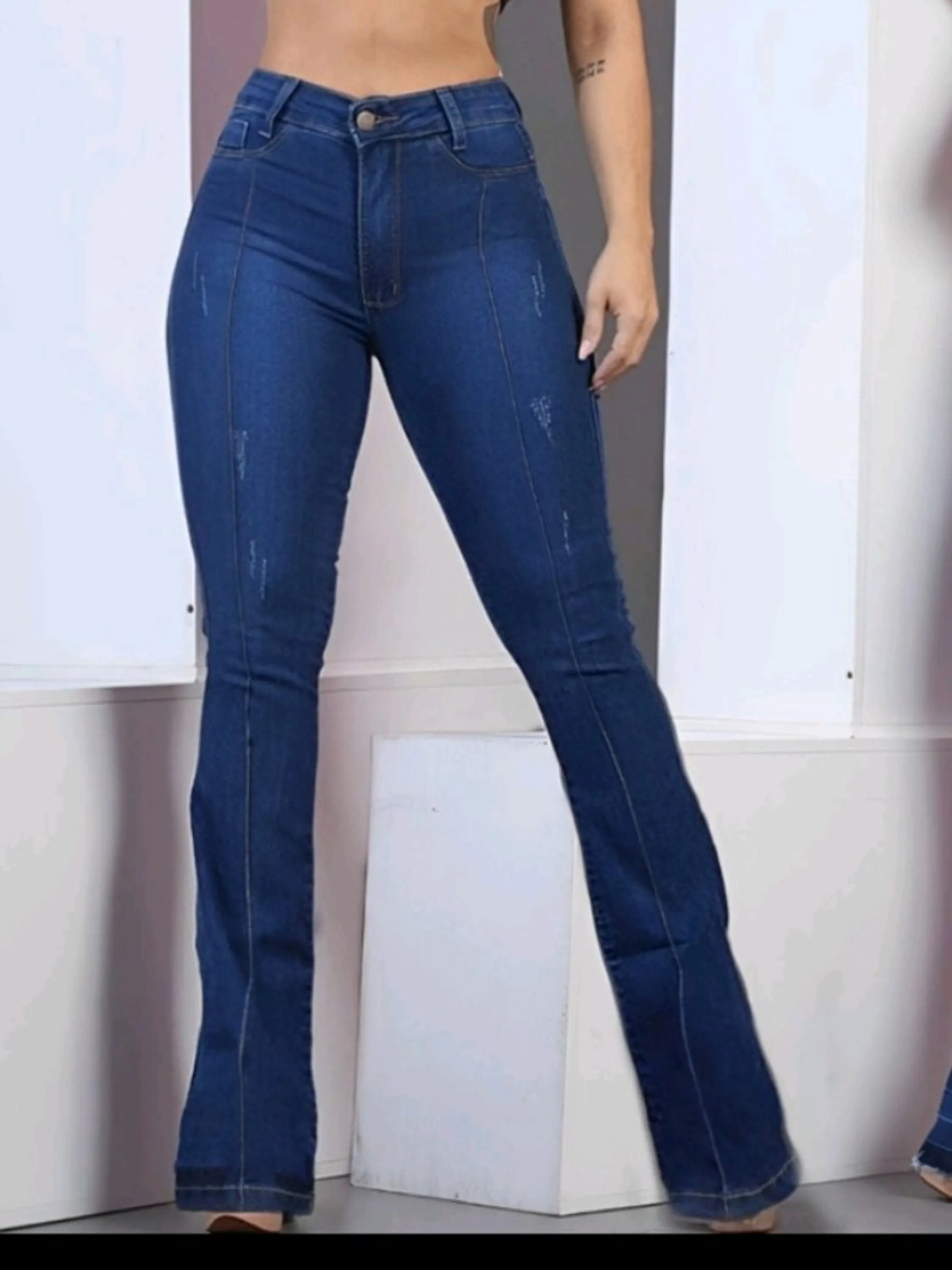 Calça jeans flear costura frente