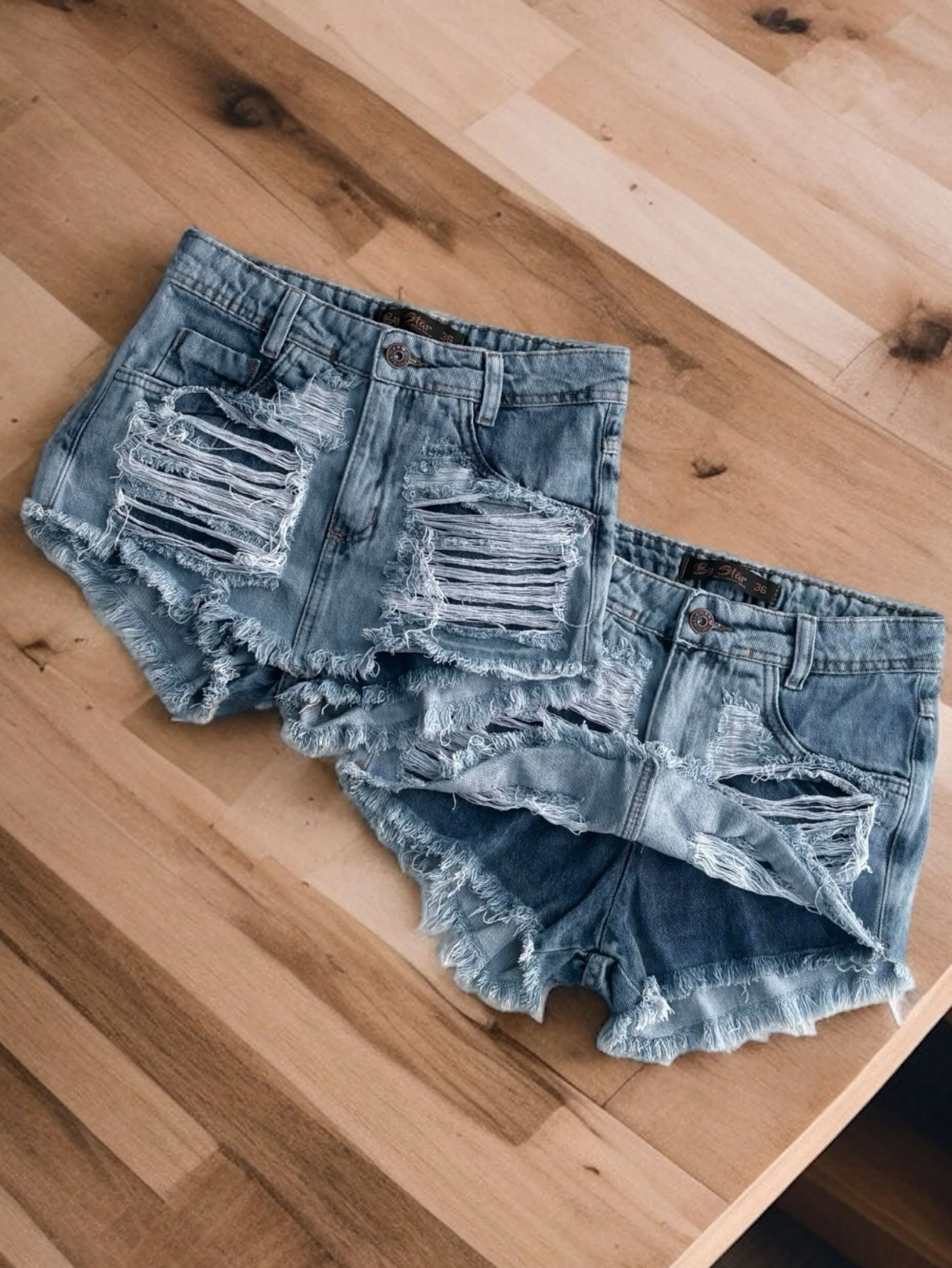 Short saia jeans clara cintura alta
