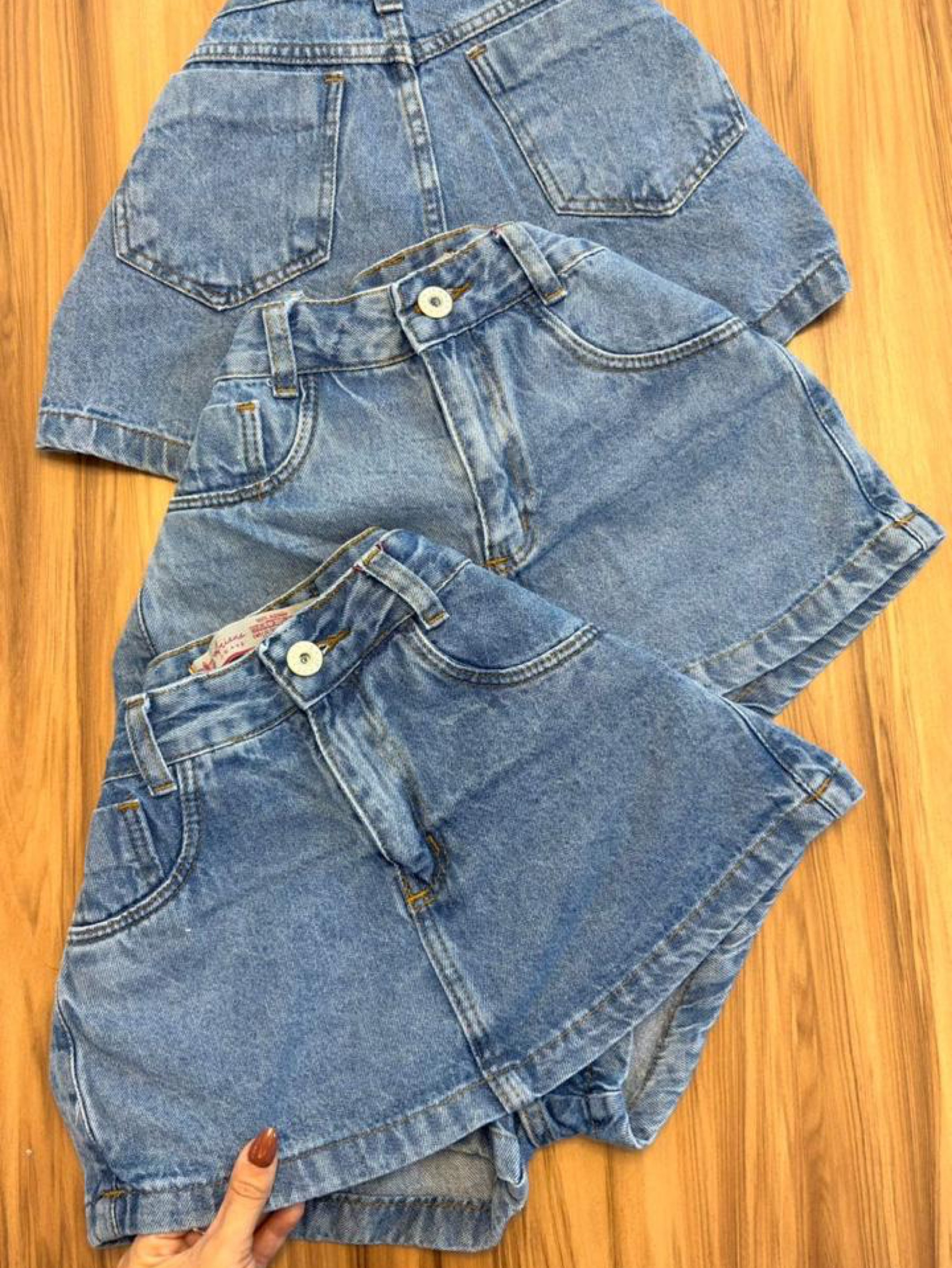 Short saia jeans feminina clara manchada nova