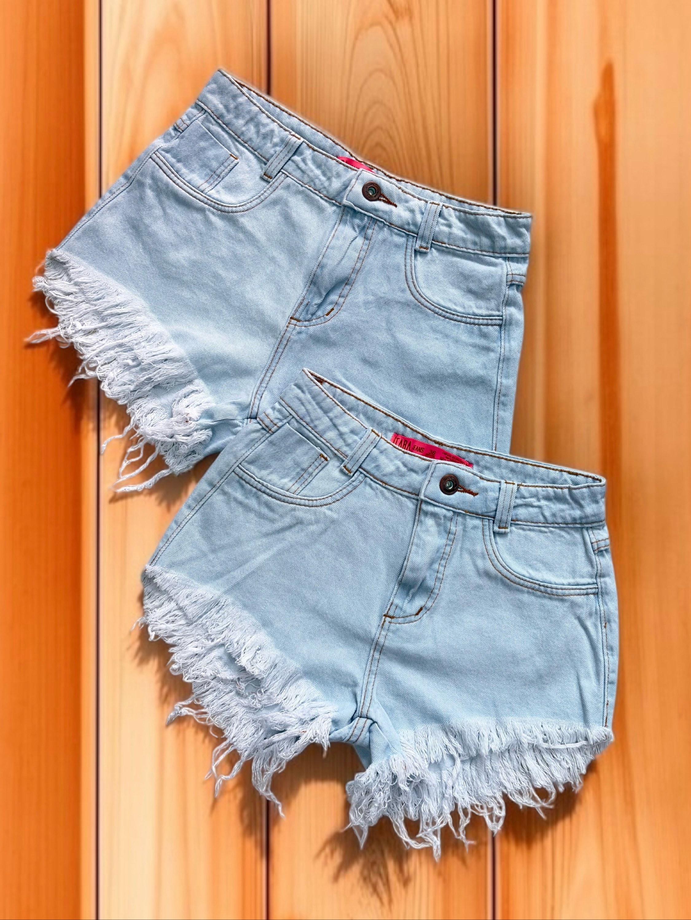 Short jeans feminino clara barra desfiado