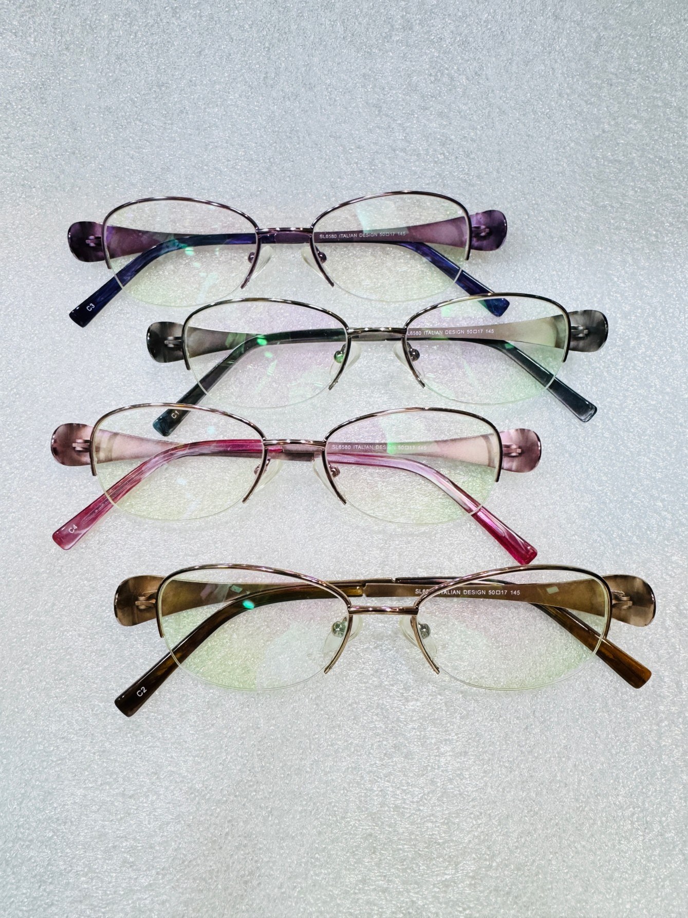 Armacao para oculos metalico ,modelo oval pequeno-6580