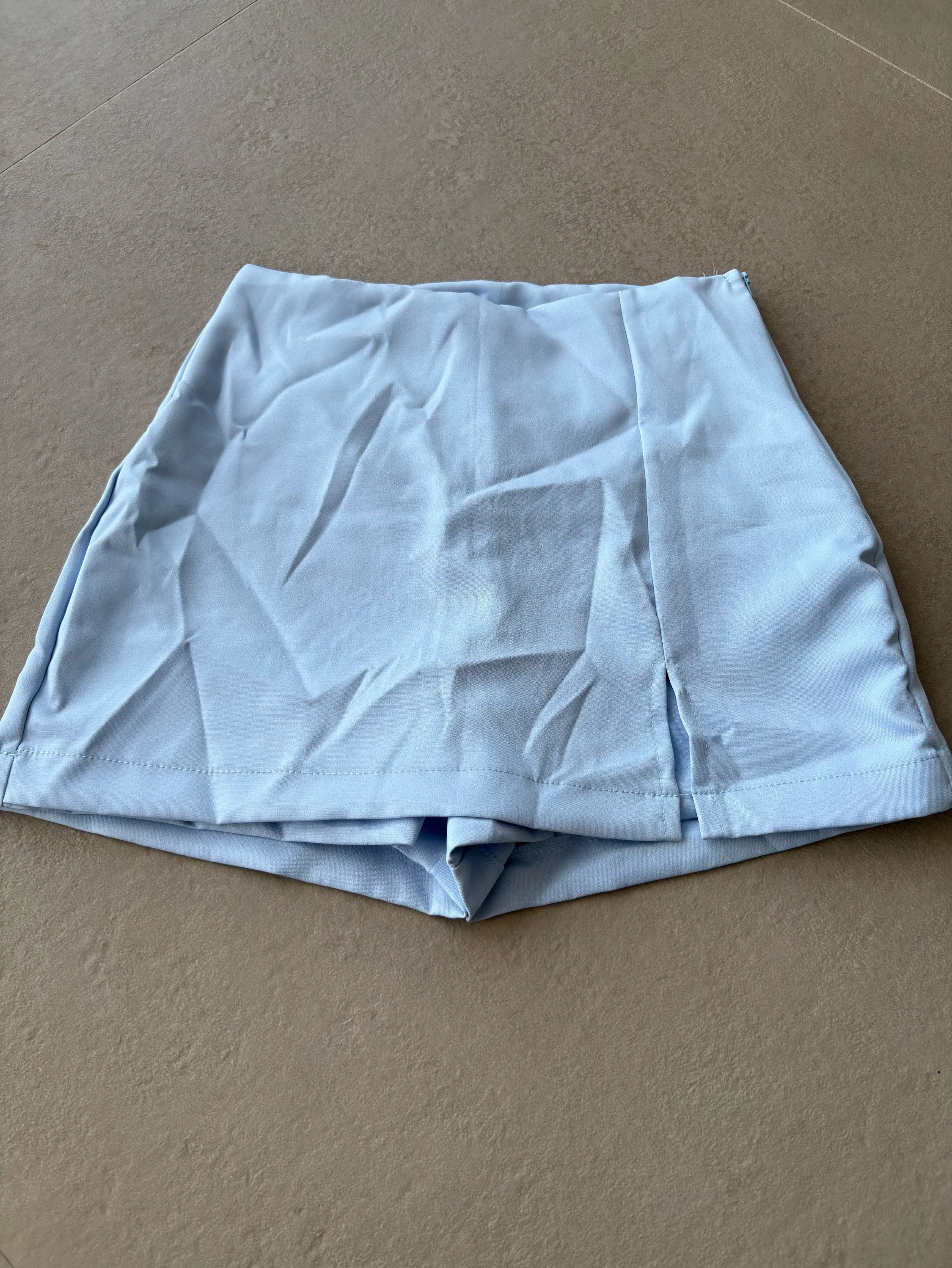 A última peça de shorts e saia