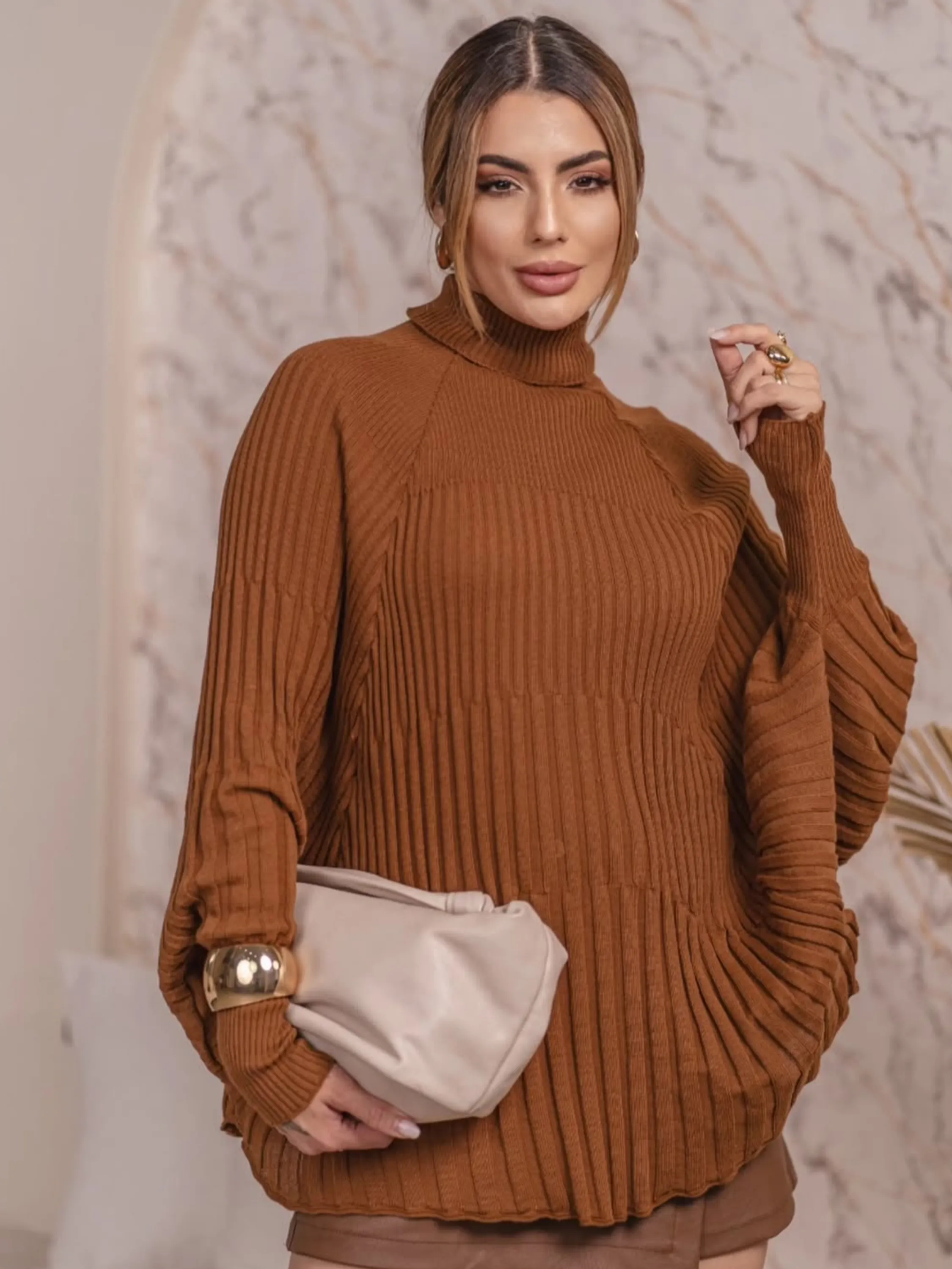 Blusa poncho tricô.