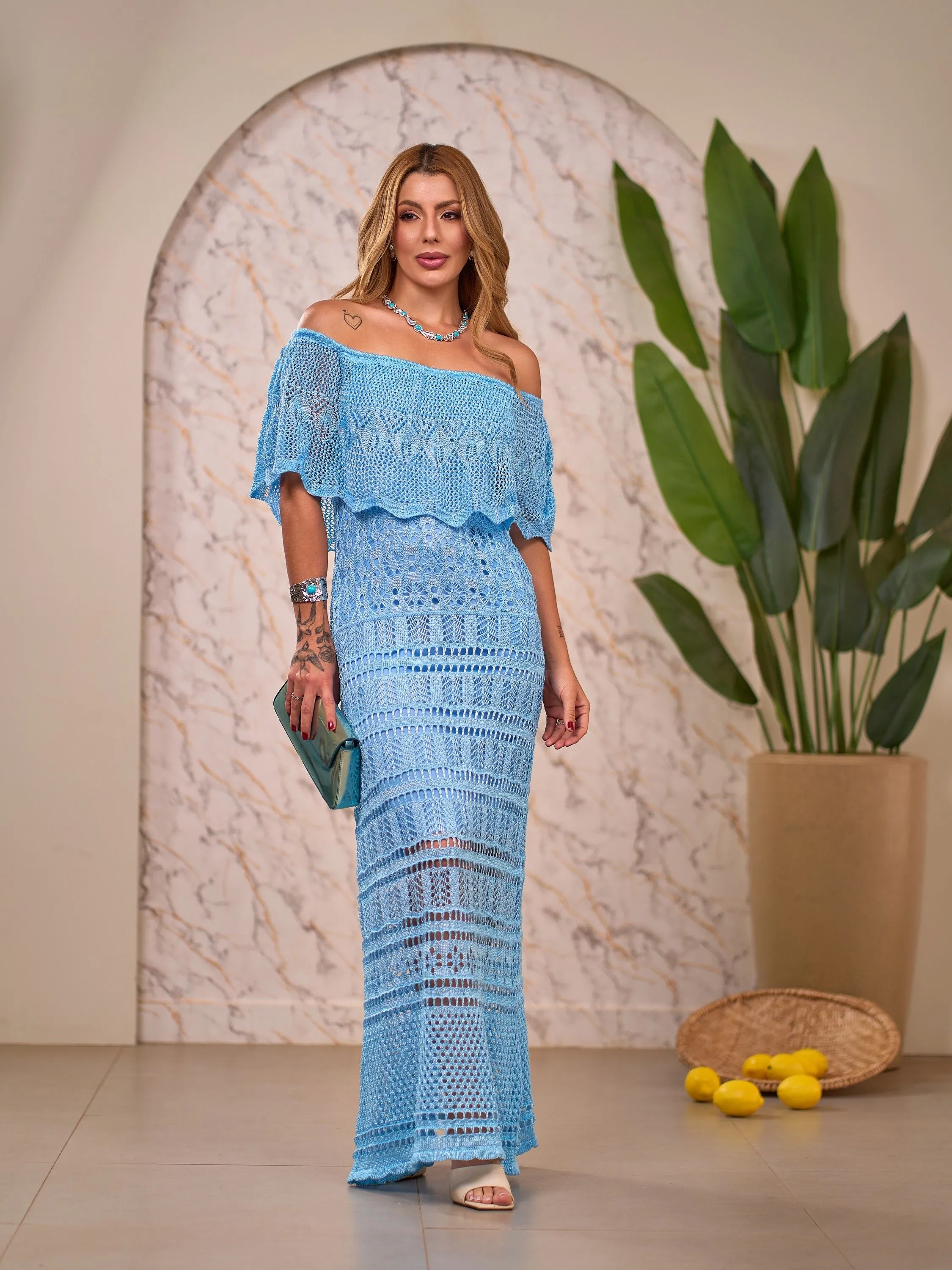 Vestido longo pala tricô.