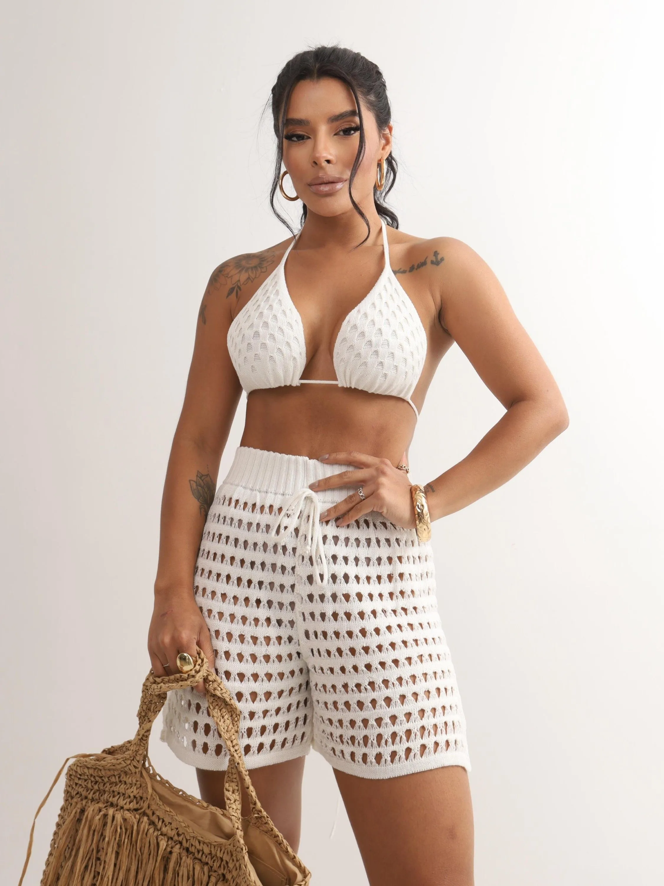 Conjunto cortininha short fenda em tricô.