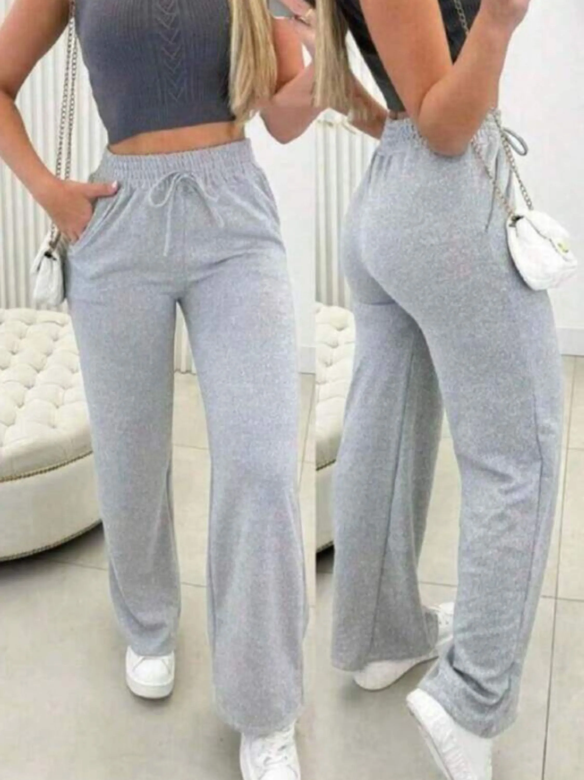 Calça pantalona com bolsos laterais