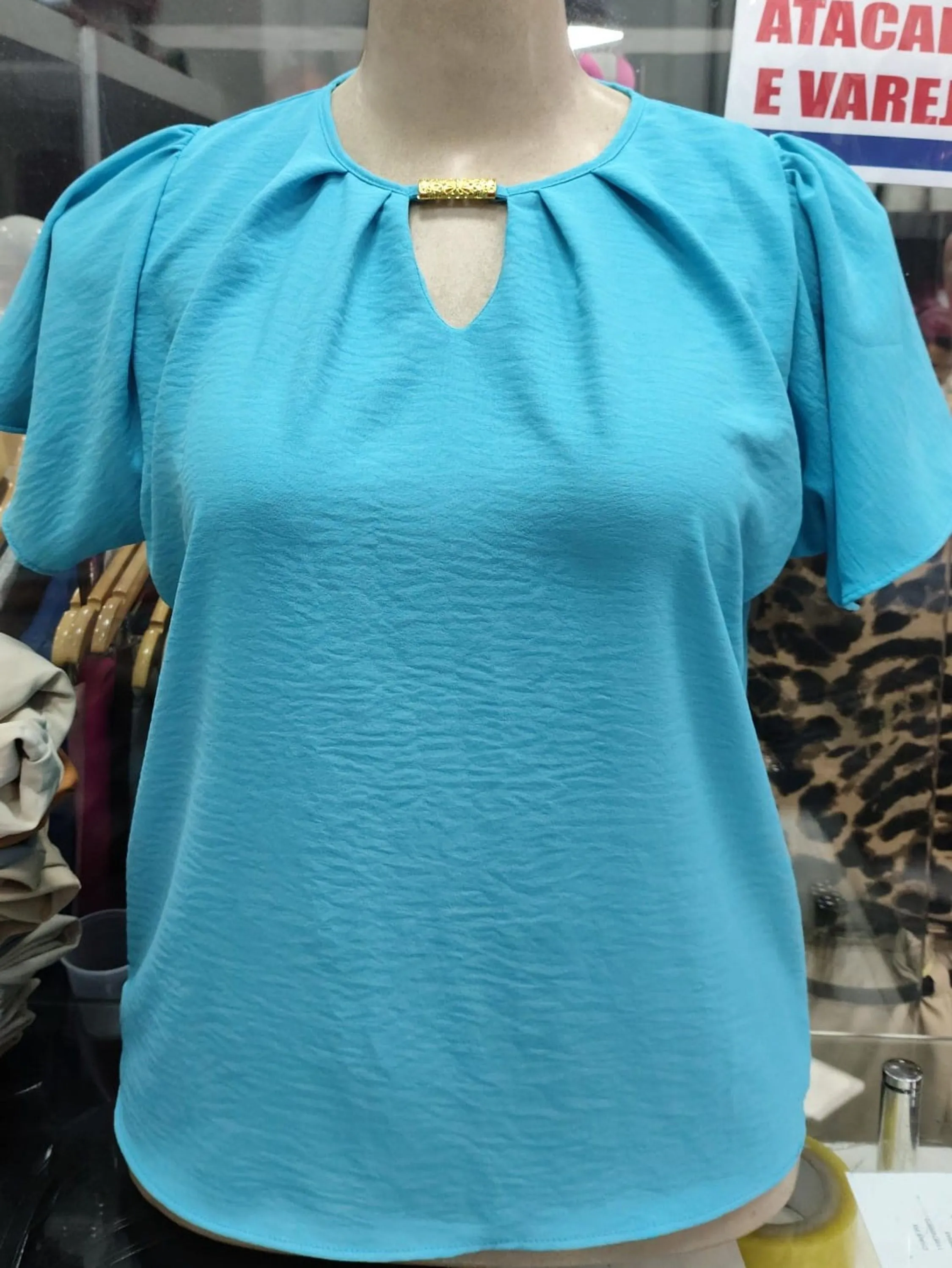 Blusa fivela plus