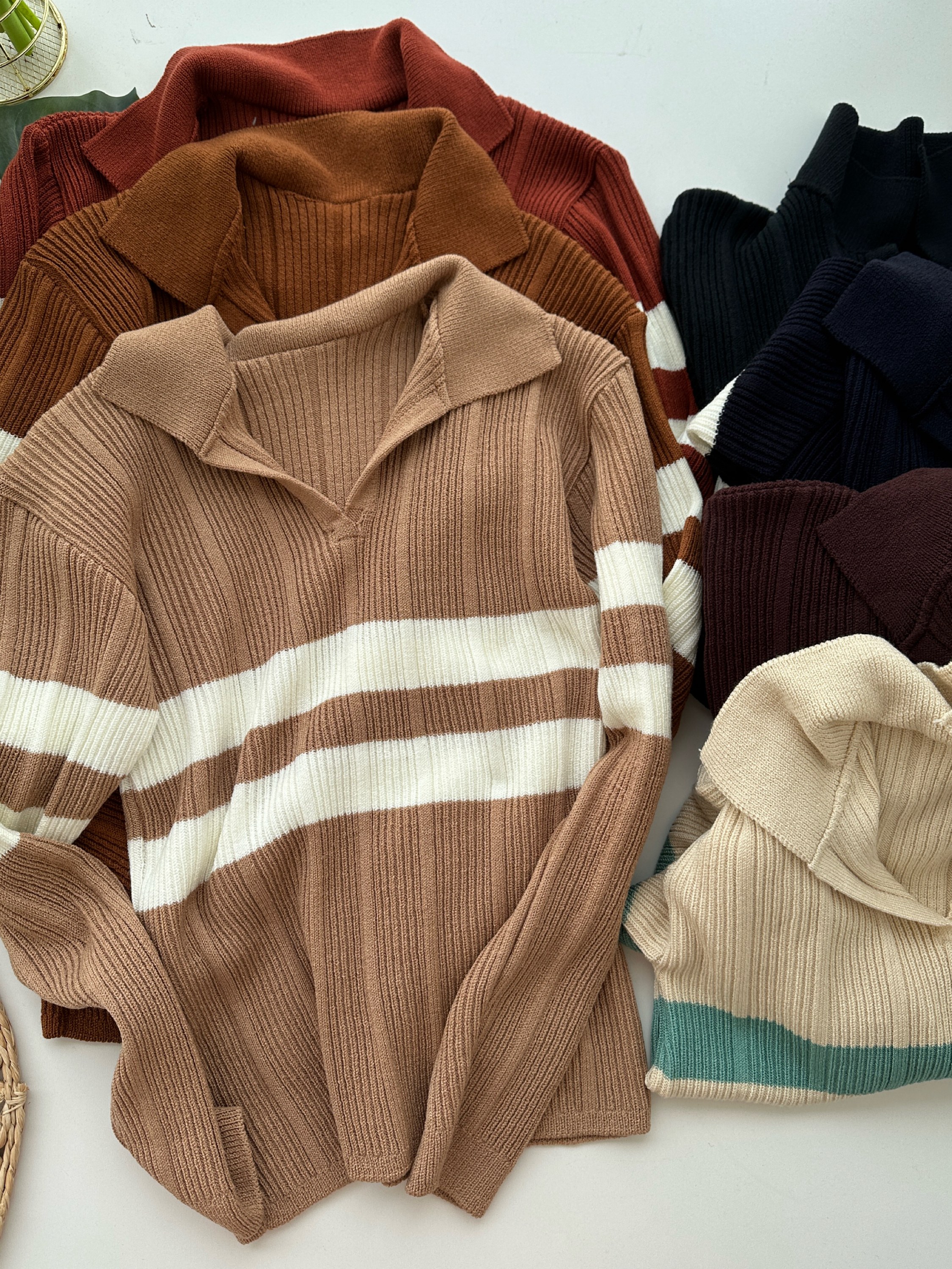 Tricô manga longa gola v