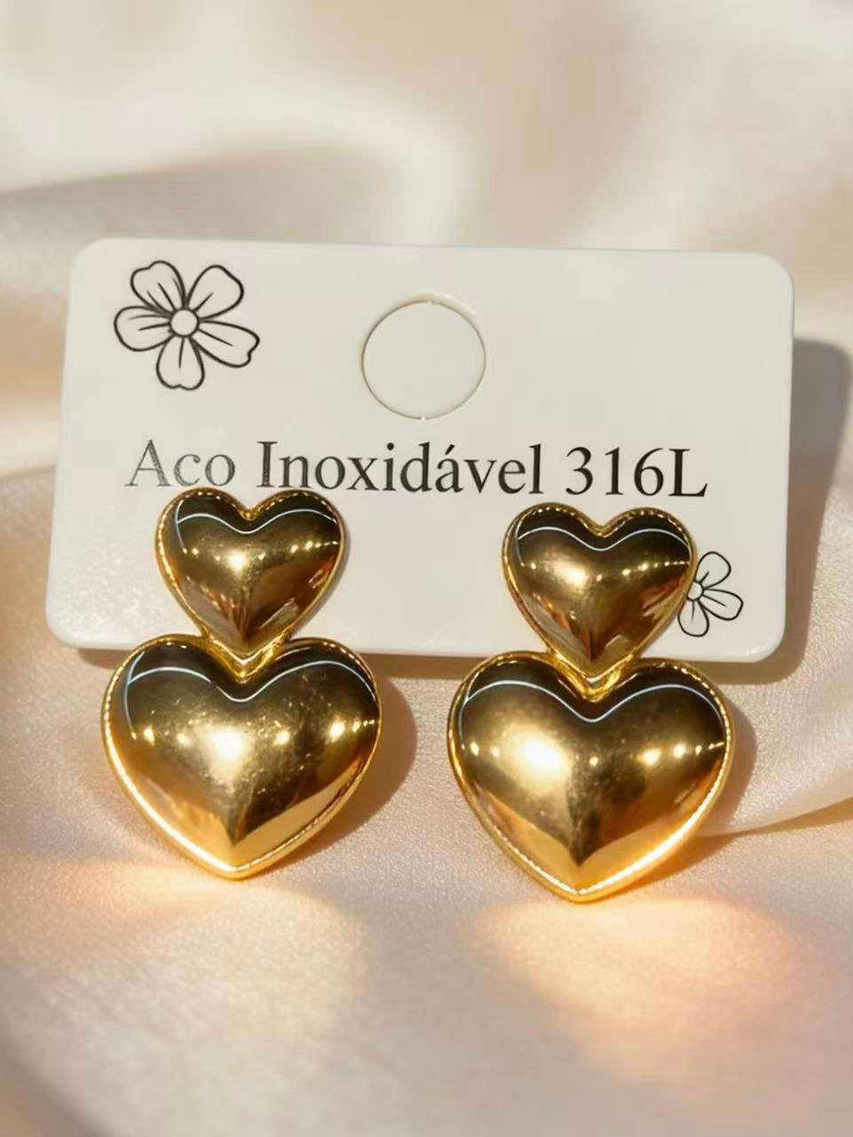 Brincos de coração duplo