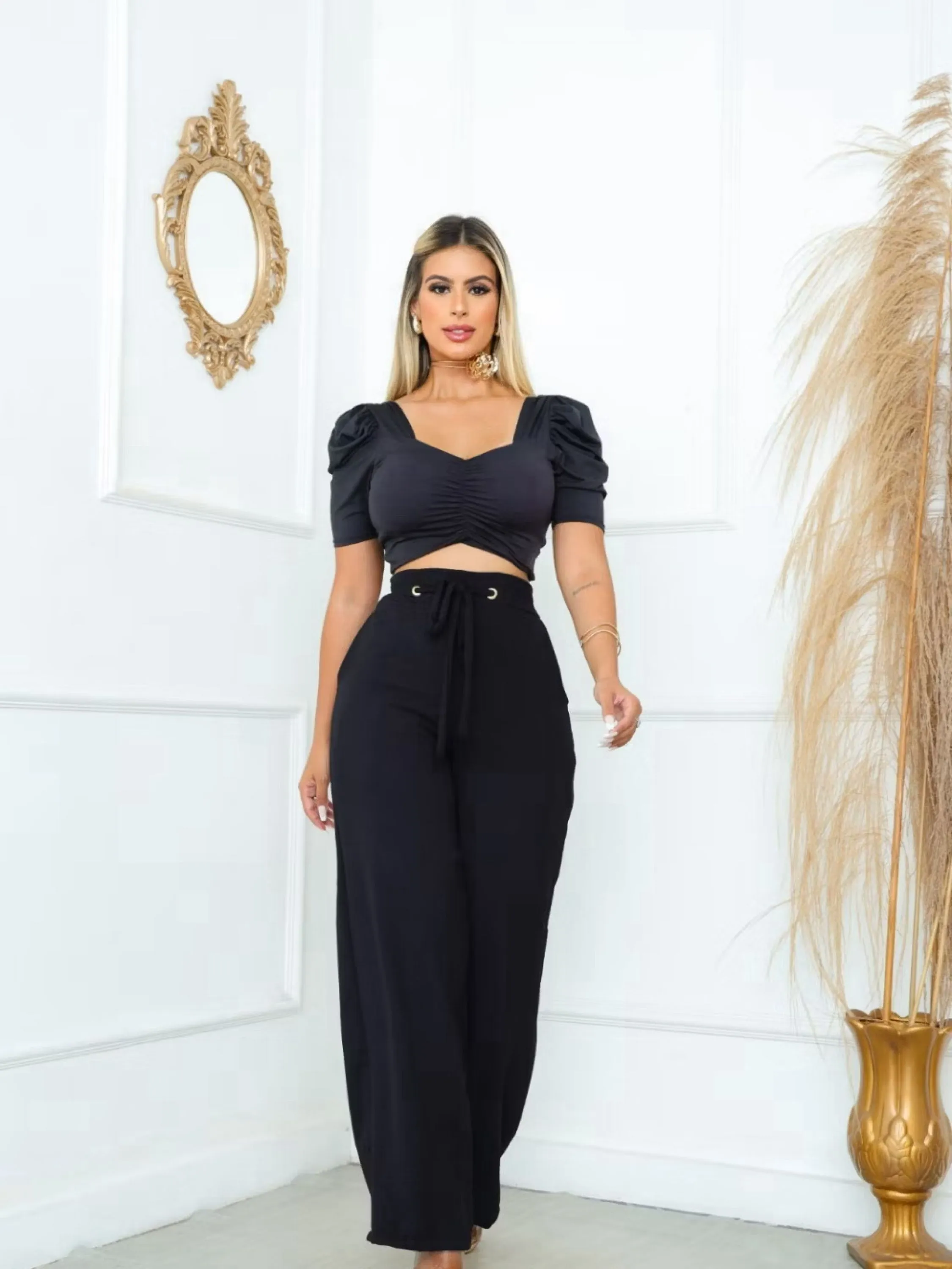 Calça ilhos