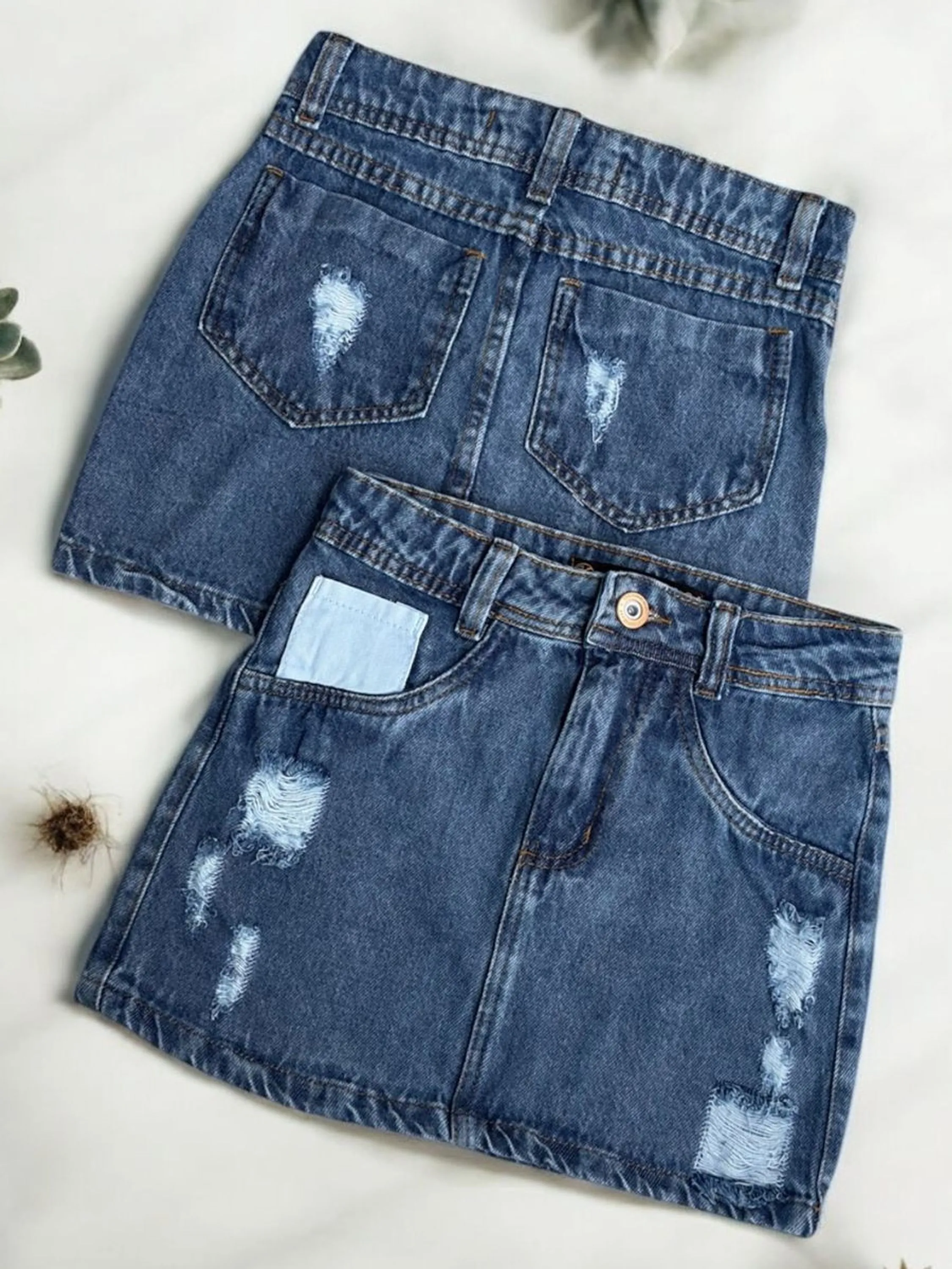 Saia jeans feminina manchada