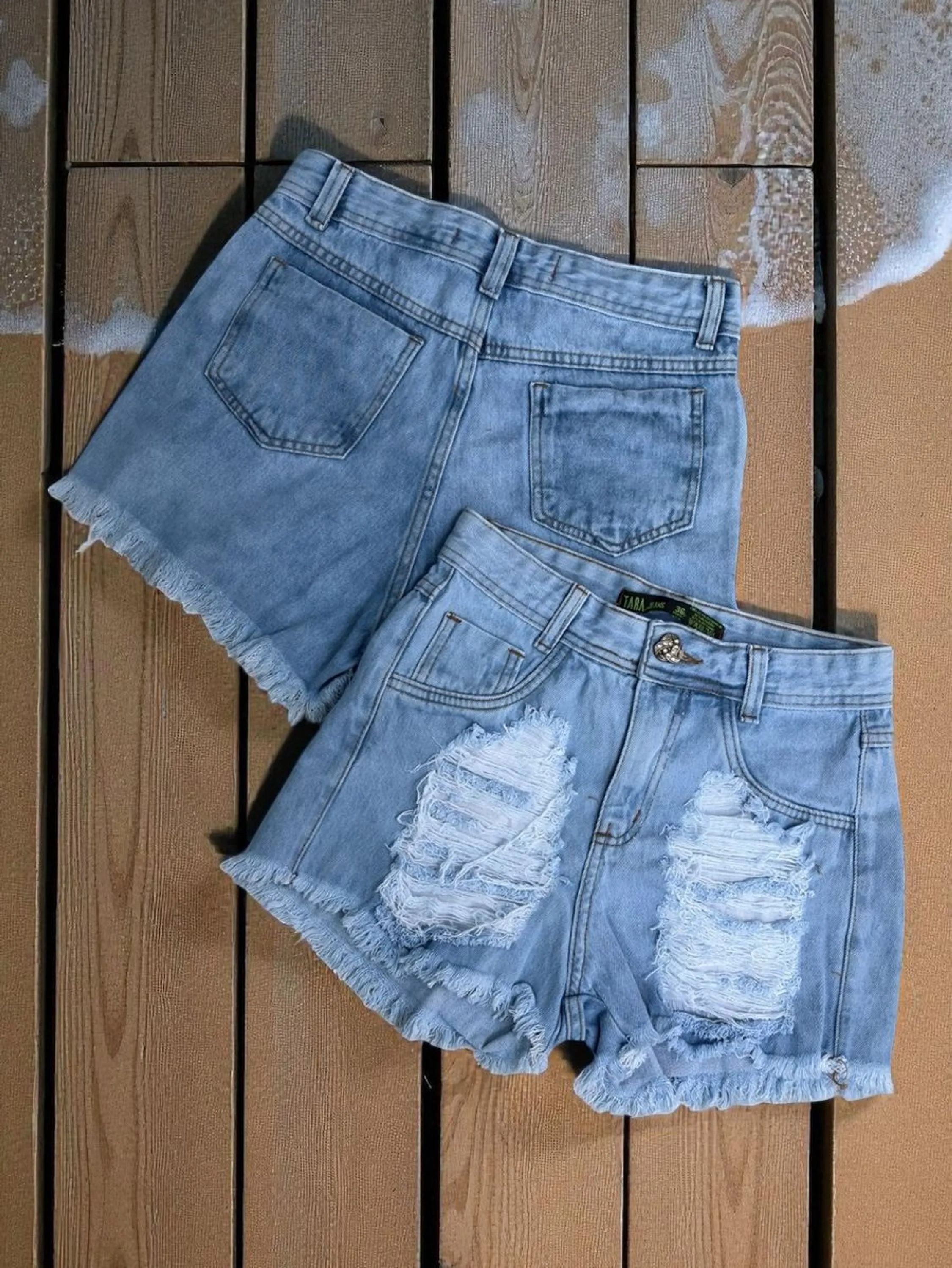 Short destroyed feminina clara