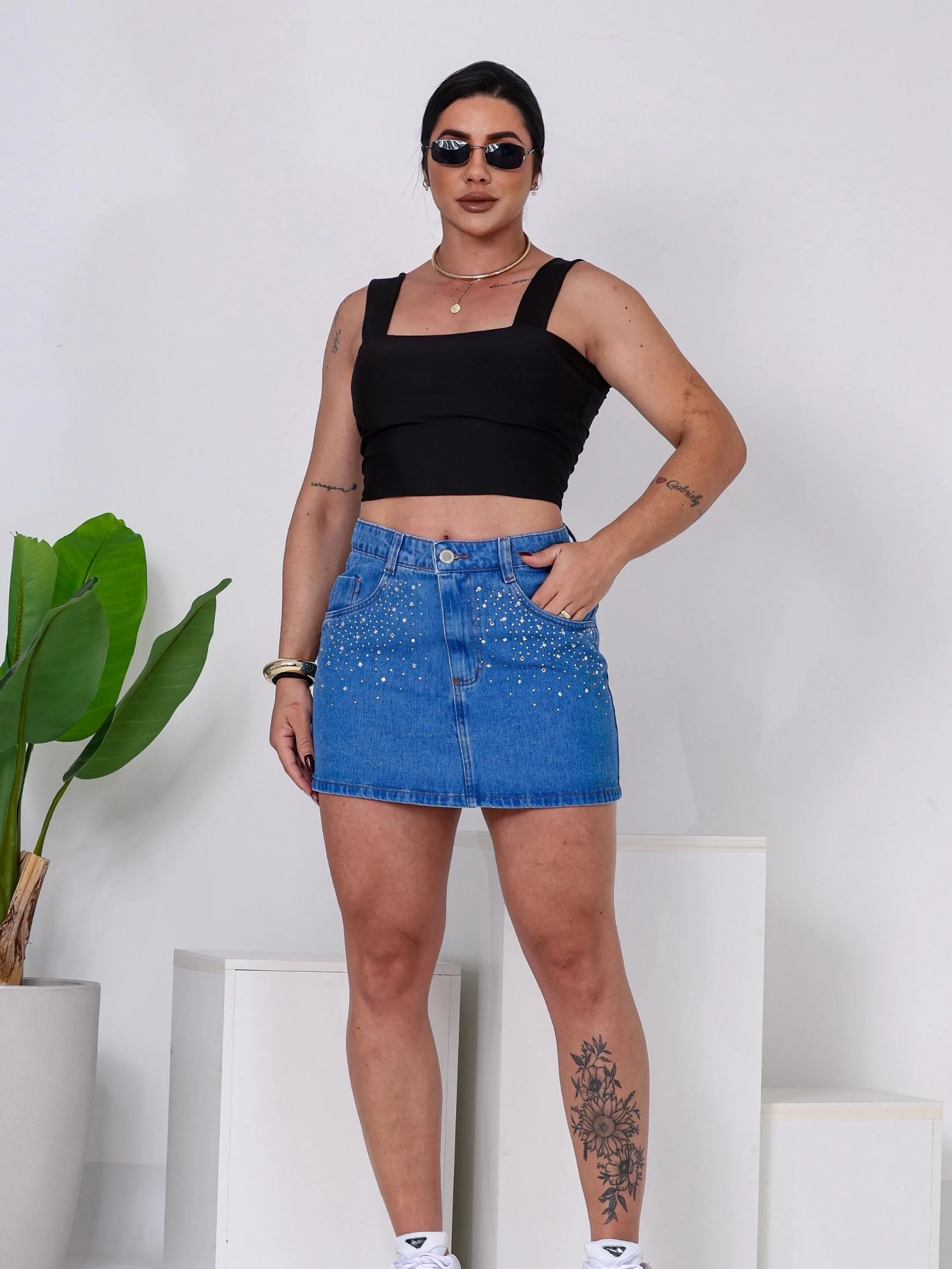 Saia Jeans com aplicação sem Lycra bolso na frente