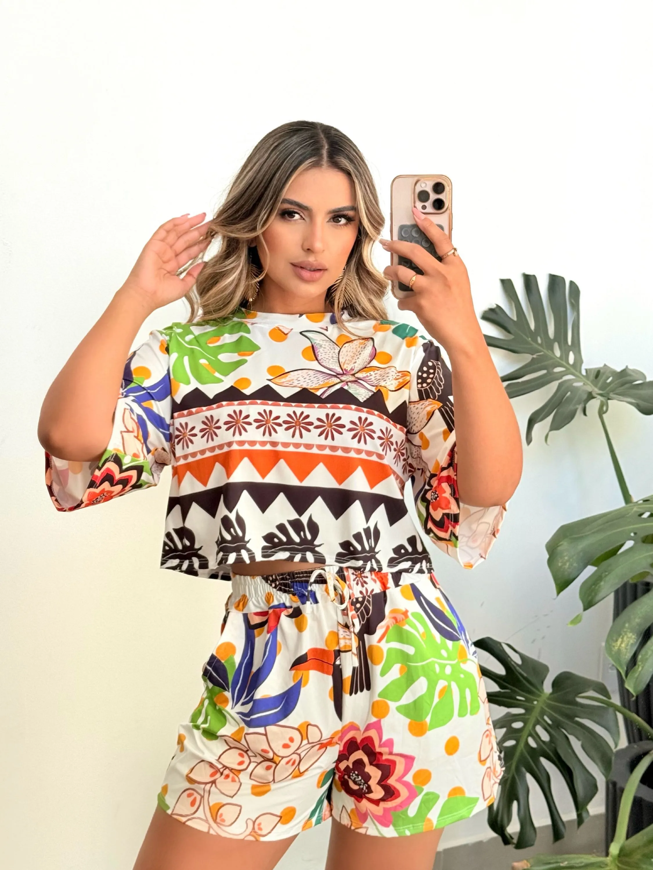 Conjunto cropped e shorts malha fluity