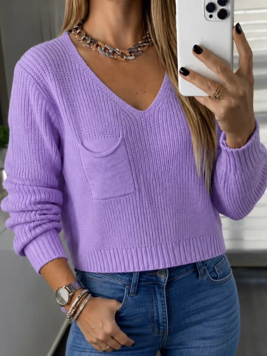 Blusa no tricôt bom detalhes de bolso