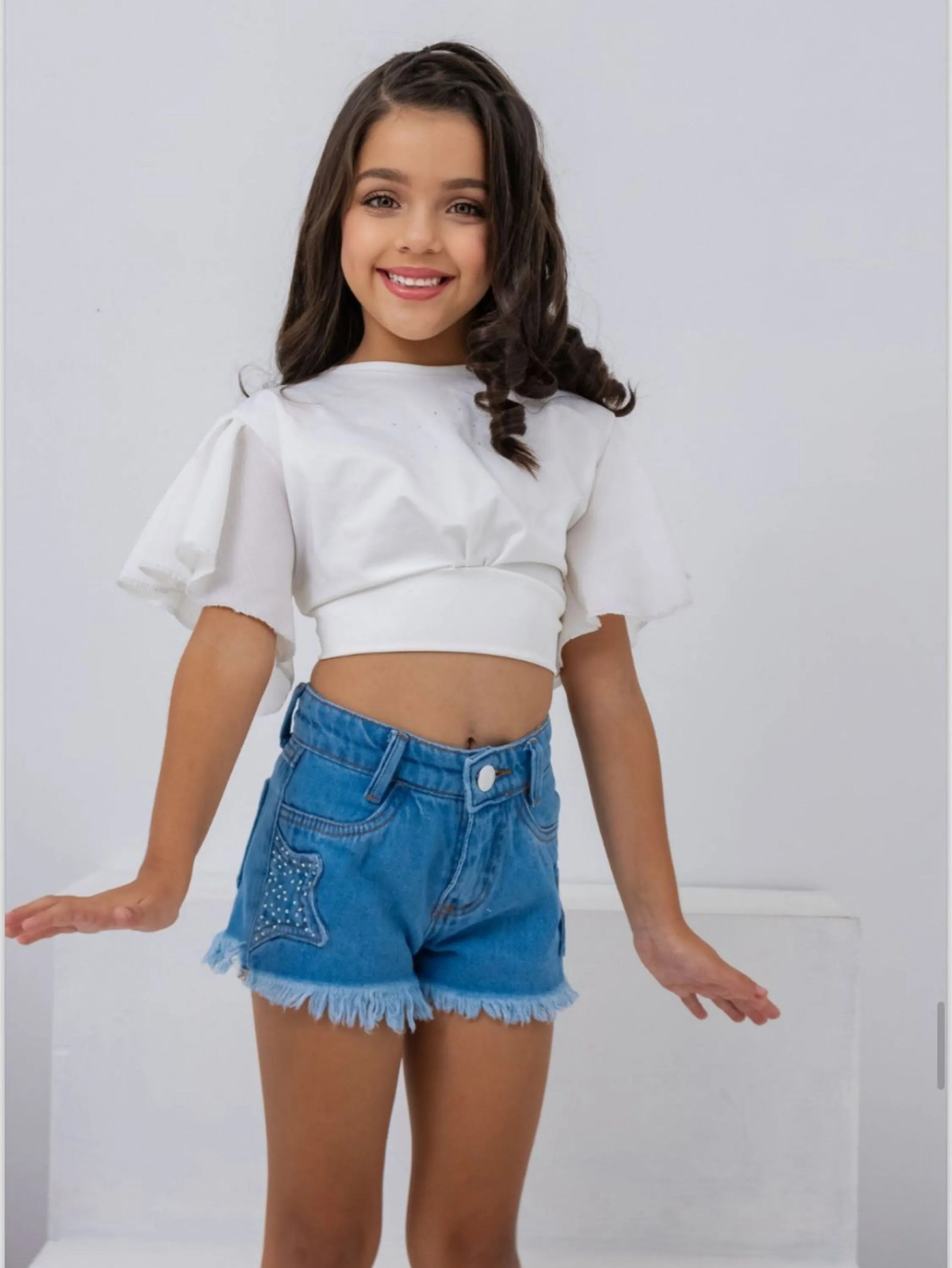 Short jeans infantil com brilho estrela