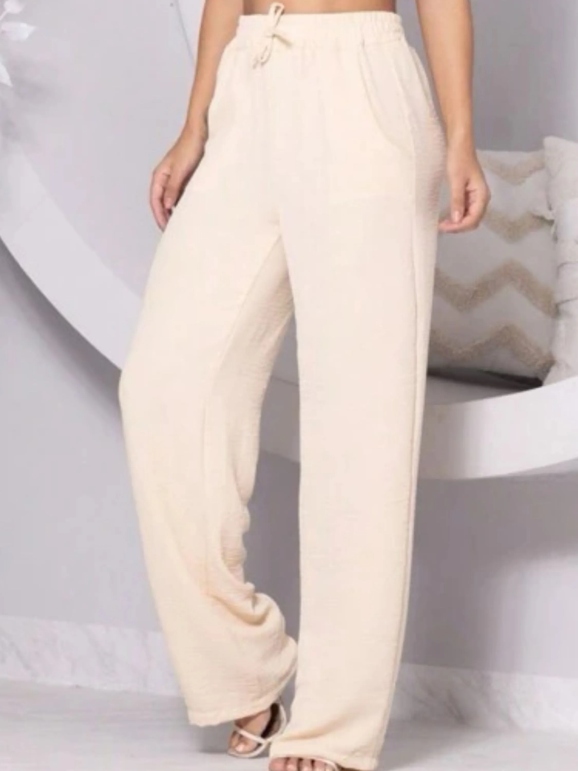 Calça pantalona feminina