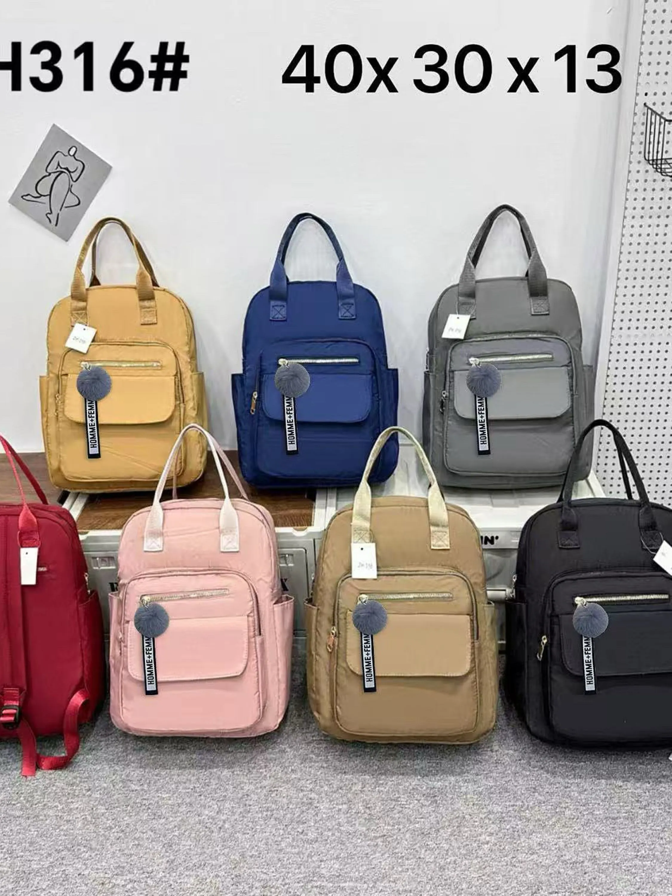 Mochila impermeável com pompom ZH316#