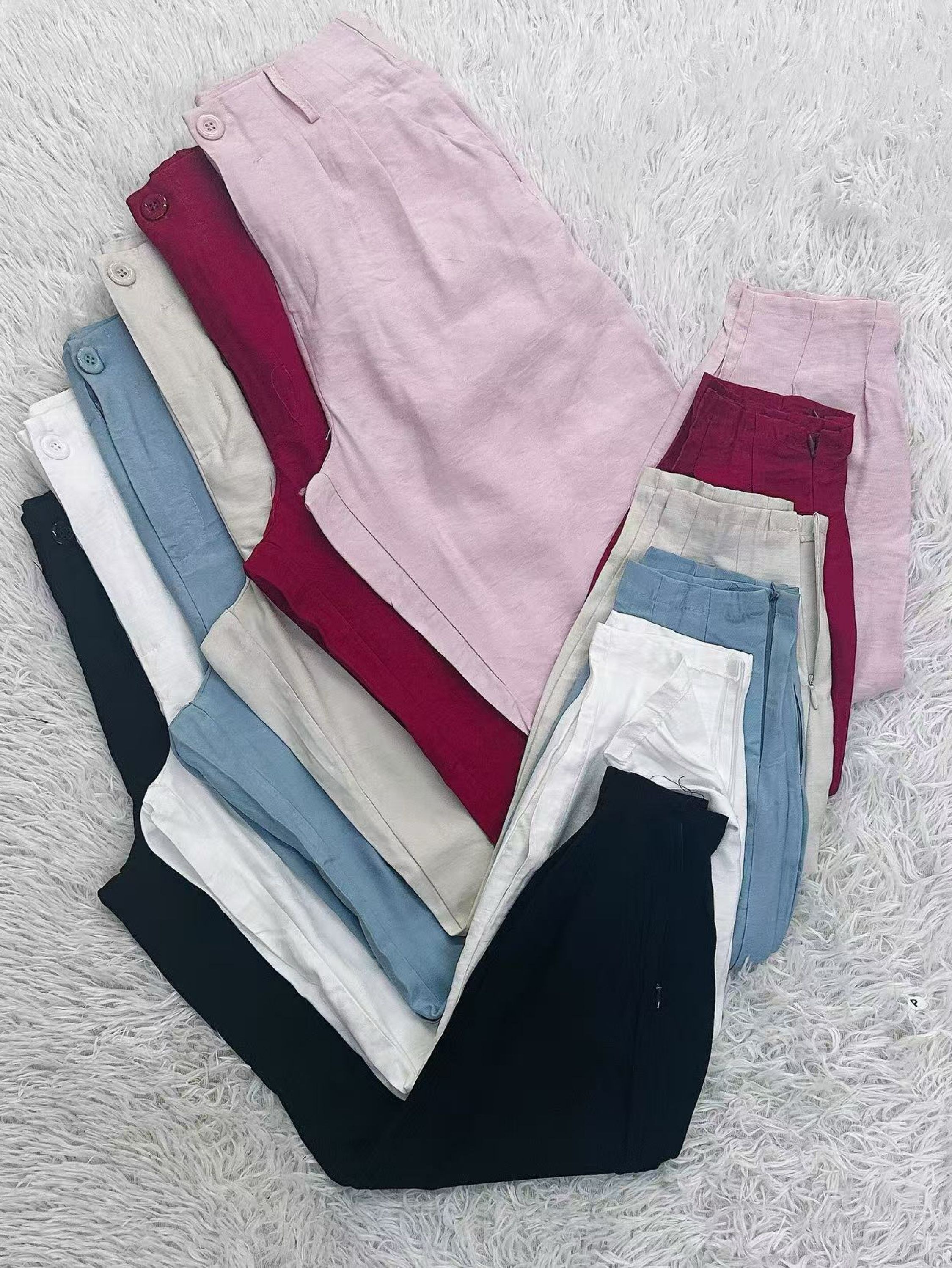 Calças femininas com zíper