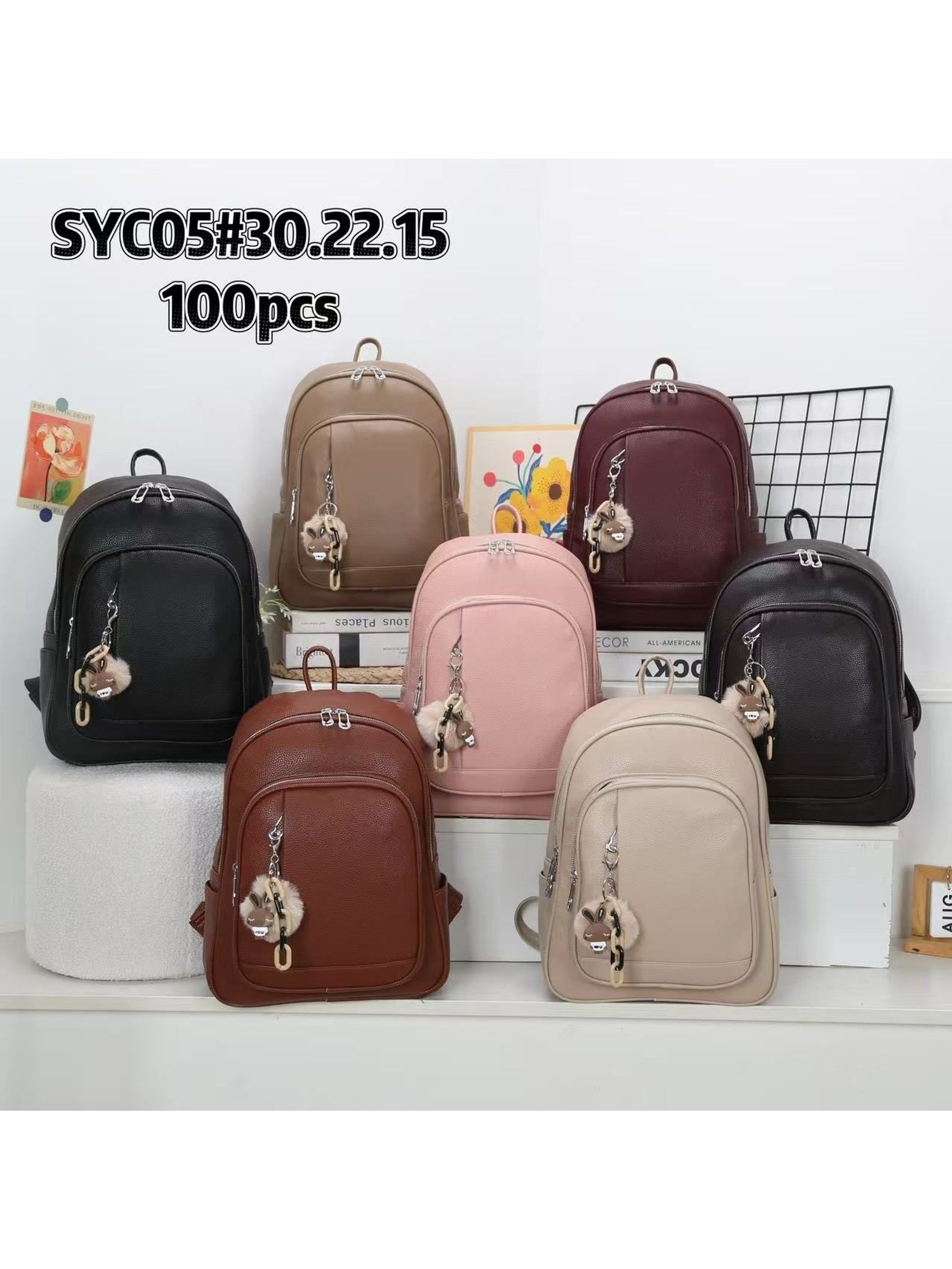 Mochila pequena com pompom Feminina Oscar Bolsas Modas