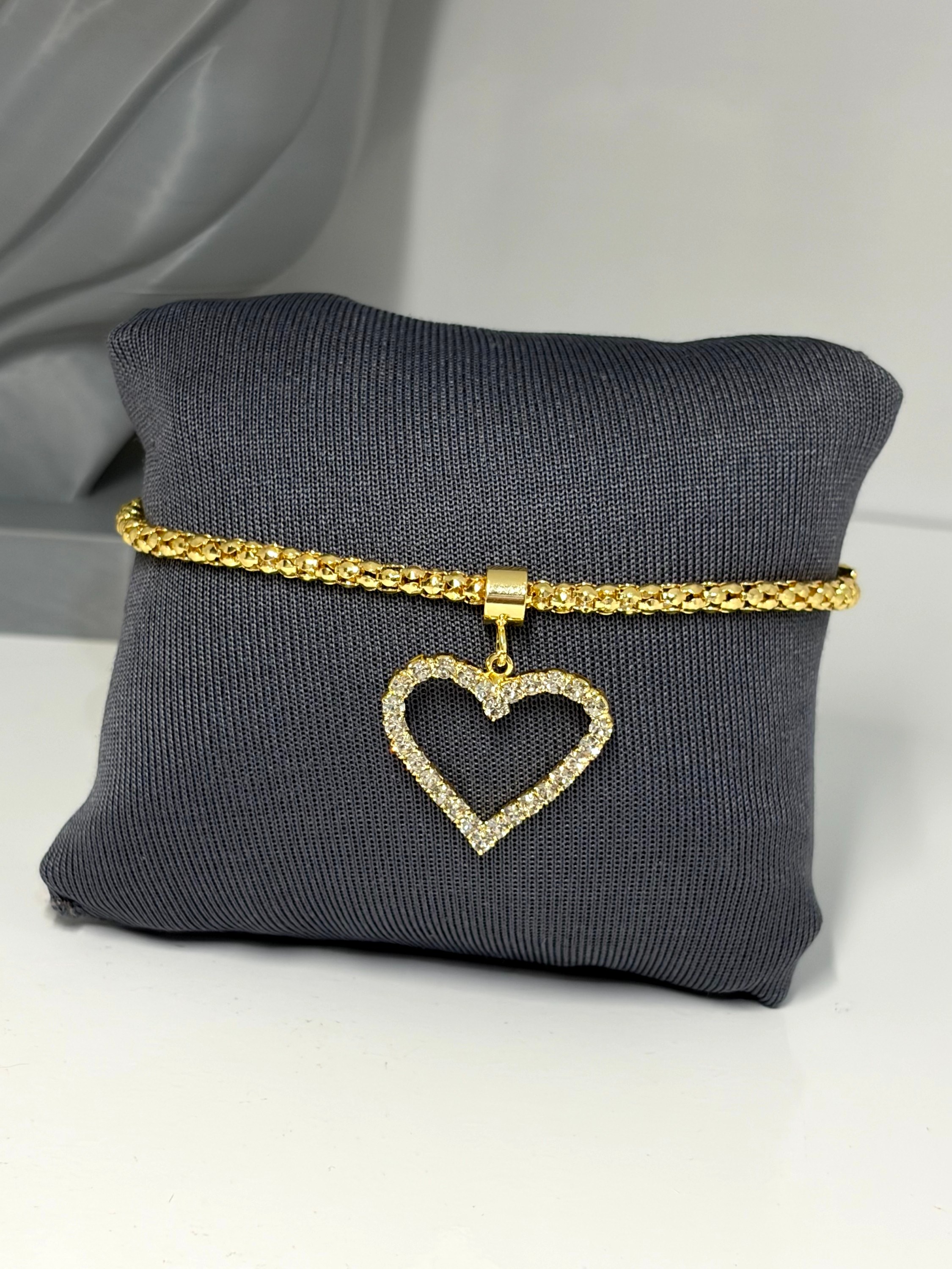 Pulseira com pingente de coração